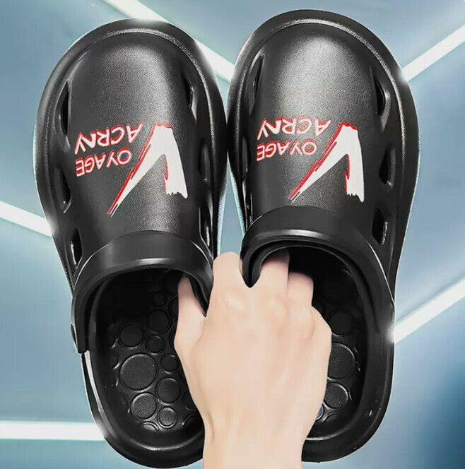 In the sand beach, he wears cool shoes with a hole in the head