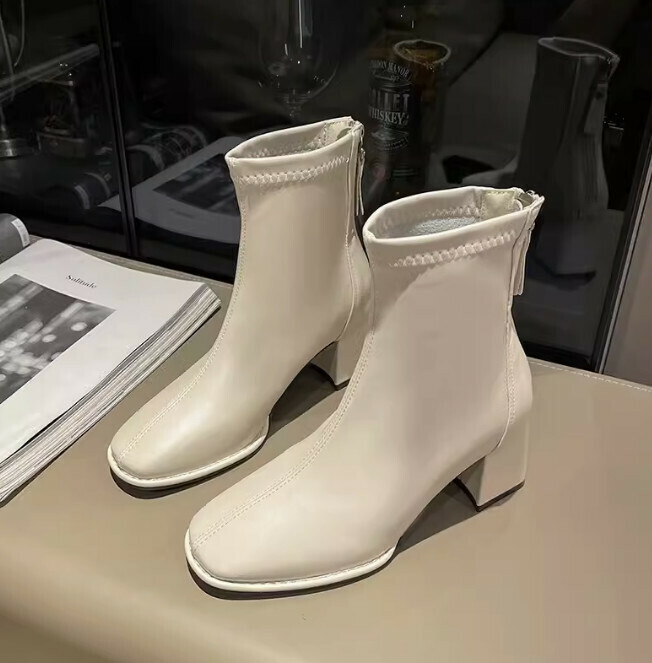 Heeled block heel booties