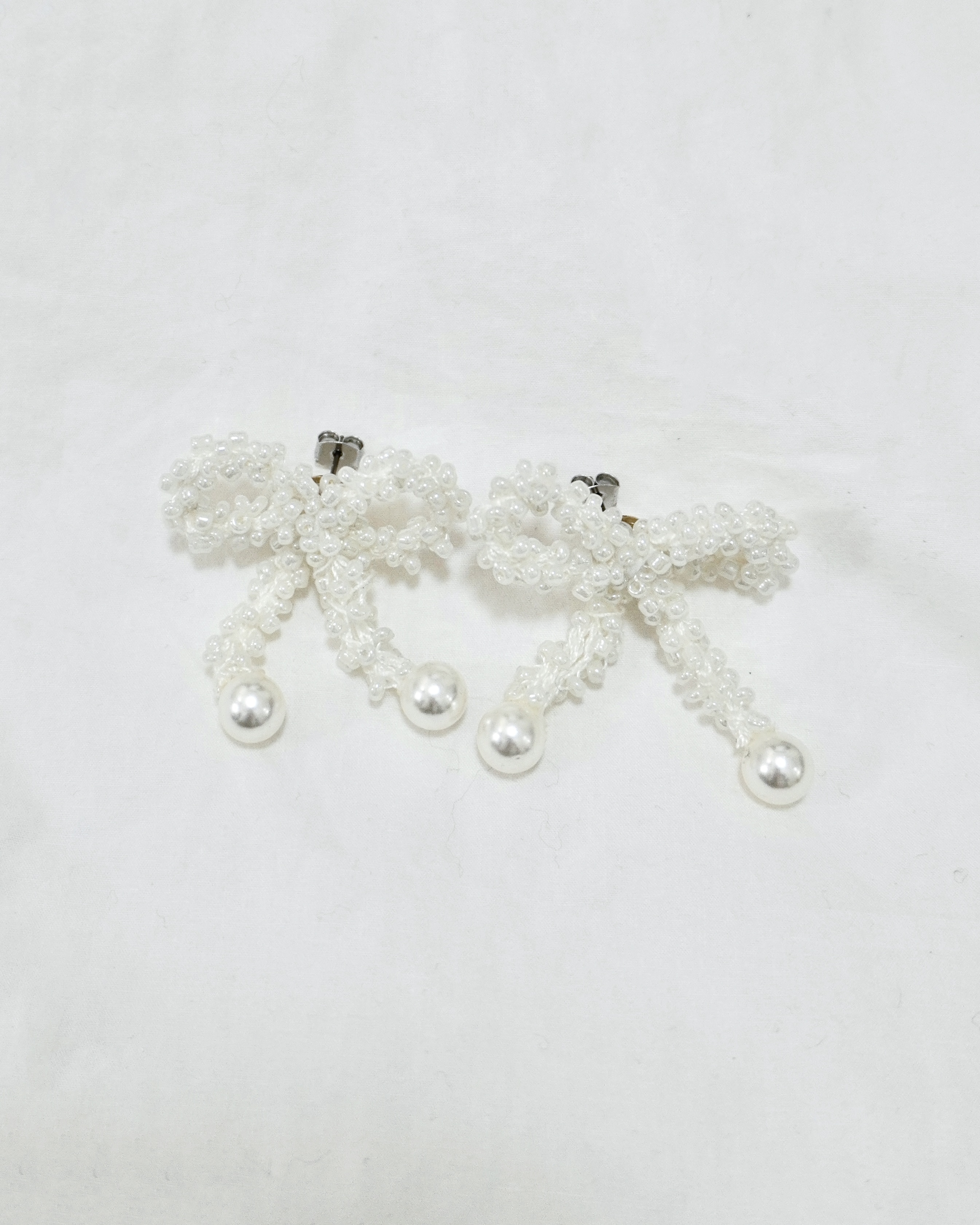 毛織珠珠蝴蝶結耳環