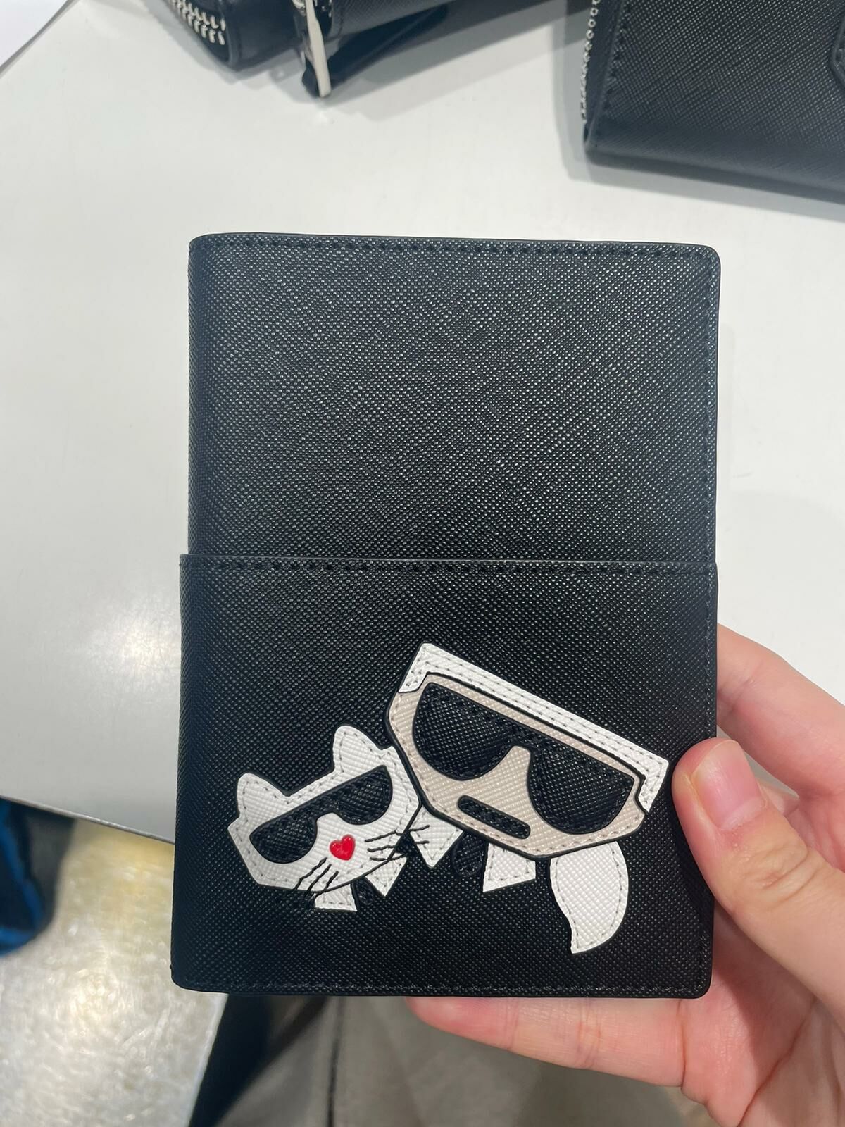 KARL LAGERFELD LEATHER PASSPORT HOLDER WITH CLASSIC LOG