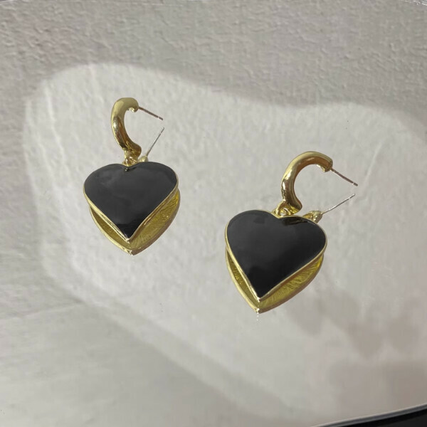 Black love ear ornament