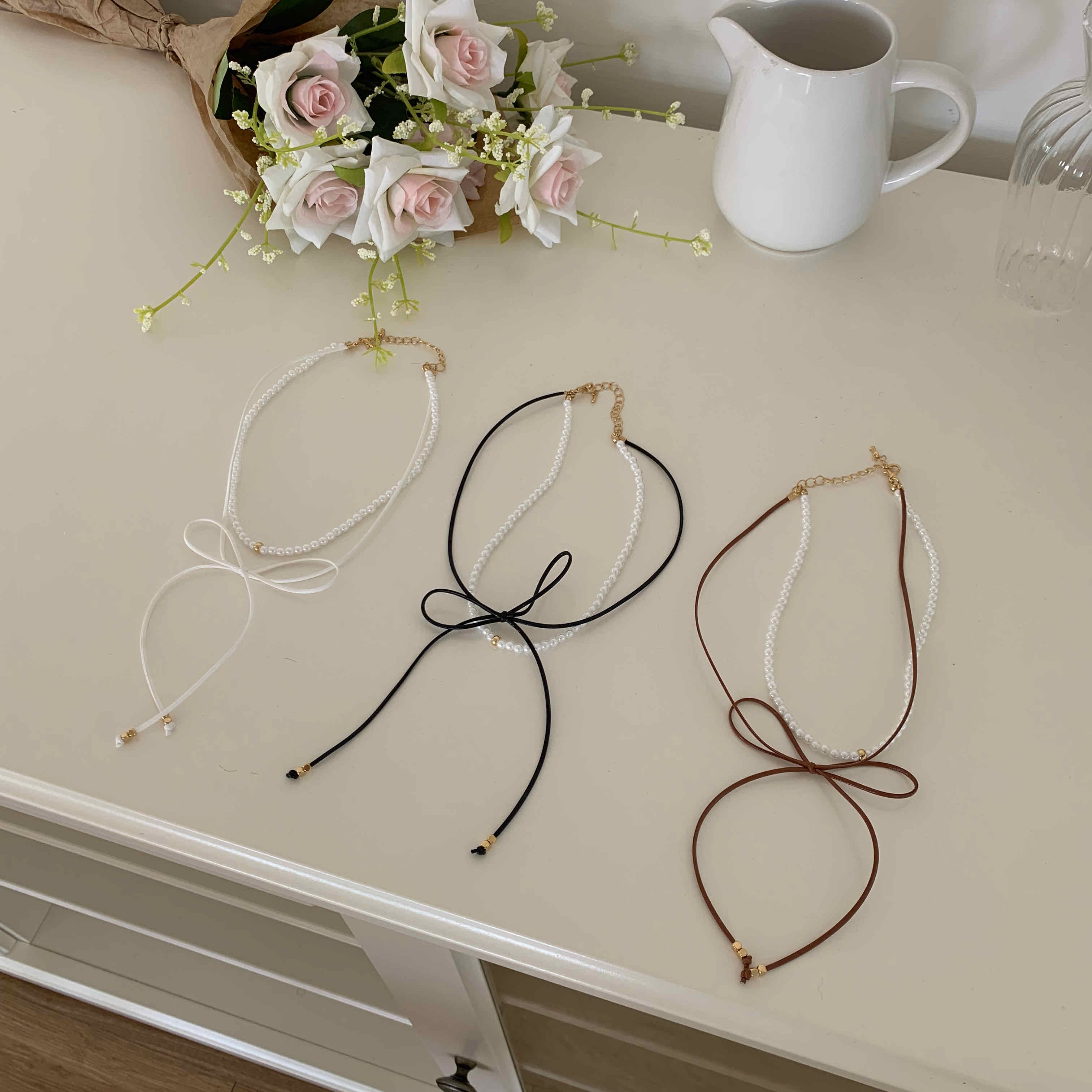 🇰🇷珍珠皮革蝴蝶結雙層項鍊｜3 color