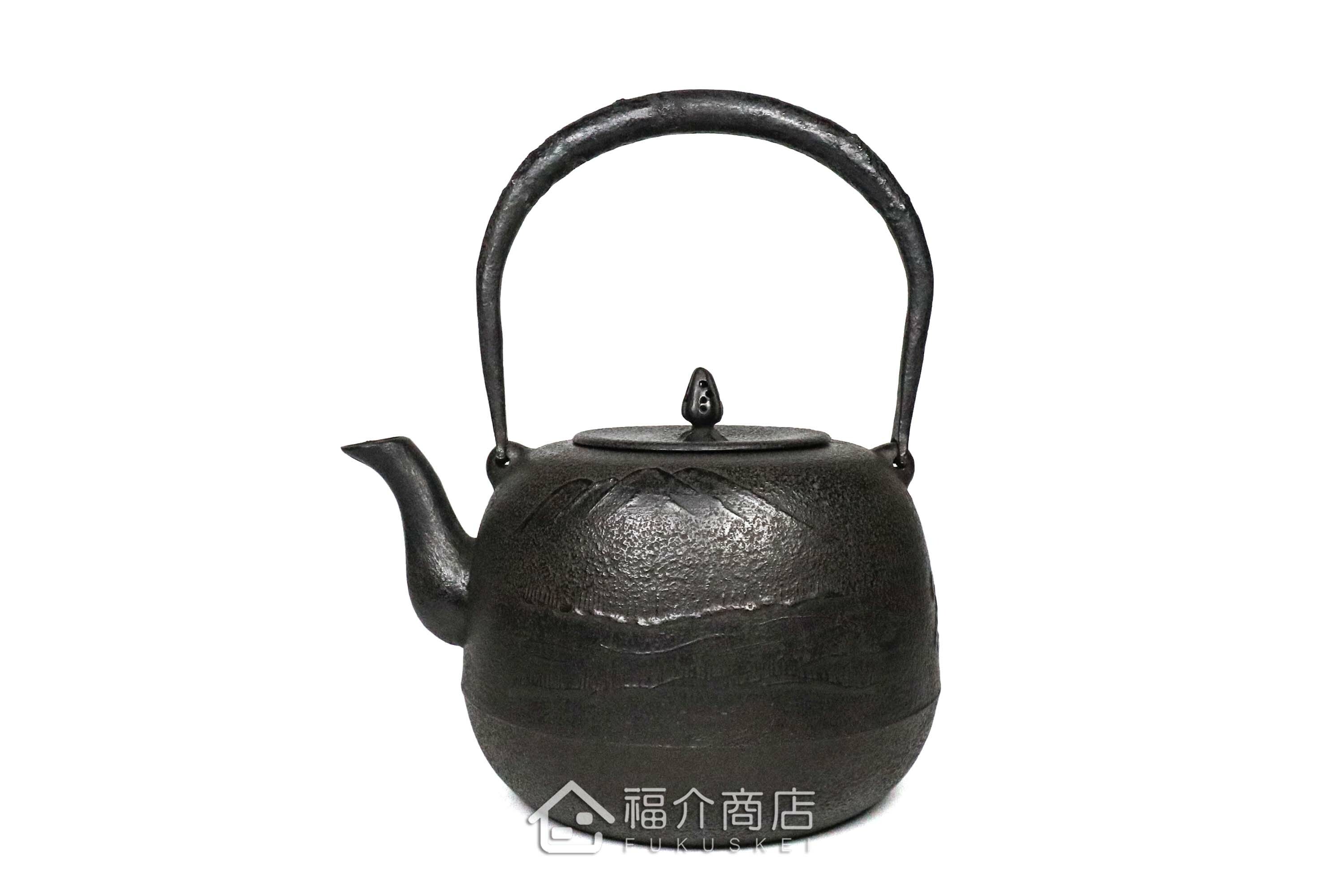 薰山工房所製作煮水泡茶用的鐵壺,壺身有櫻鮭紋飾