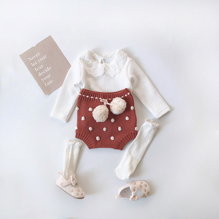 布蕾絲坑條上衣