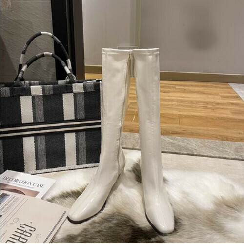 Boxy patent leather boots