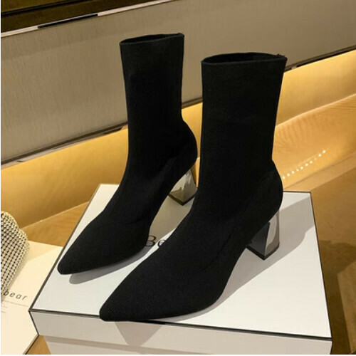 Pointed needle knitted saddled boots