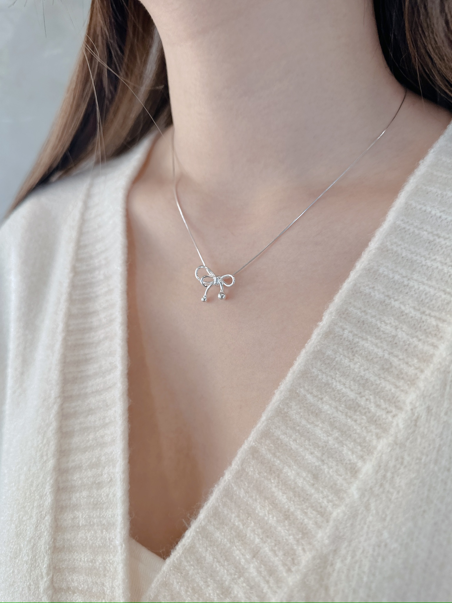 K33貼心．素面立體蝴蝶結純銀鎖骨鏈