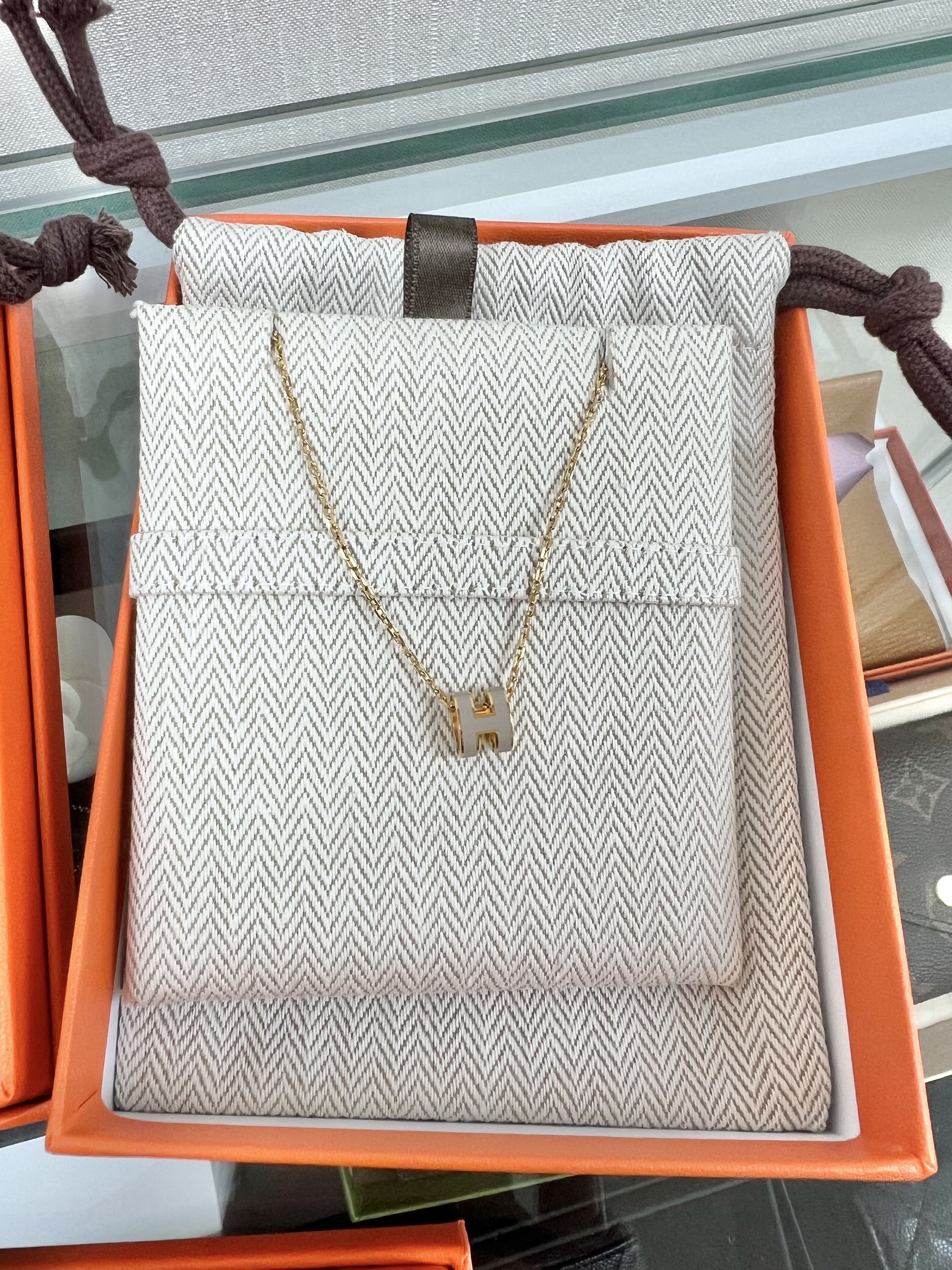 *Unused* Hermes mini pop h necklace (marron glace/gold hardware)