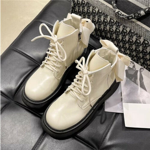 Butterfly knotted small crowd platform booties