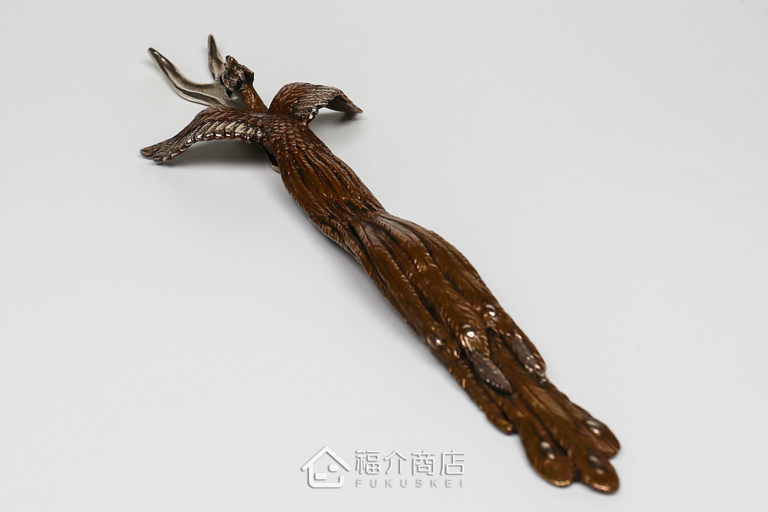 拿起茶壺壺蓋用的蓋取