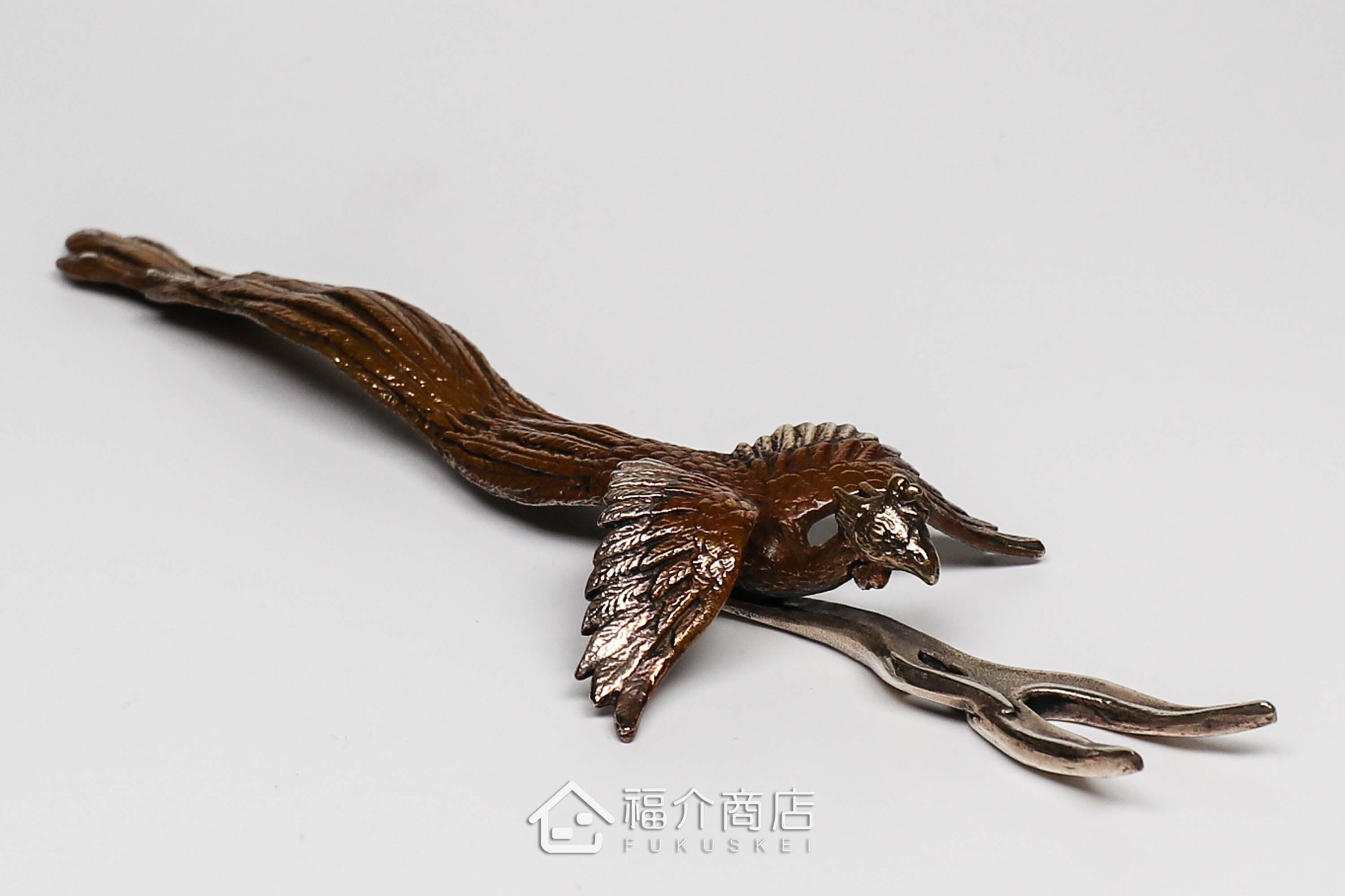 拿起茶壺壺蓋用的蓋取