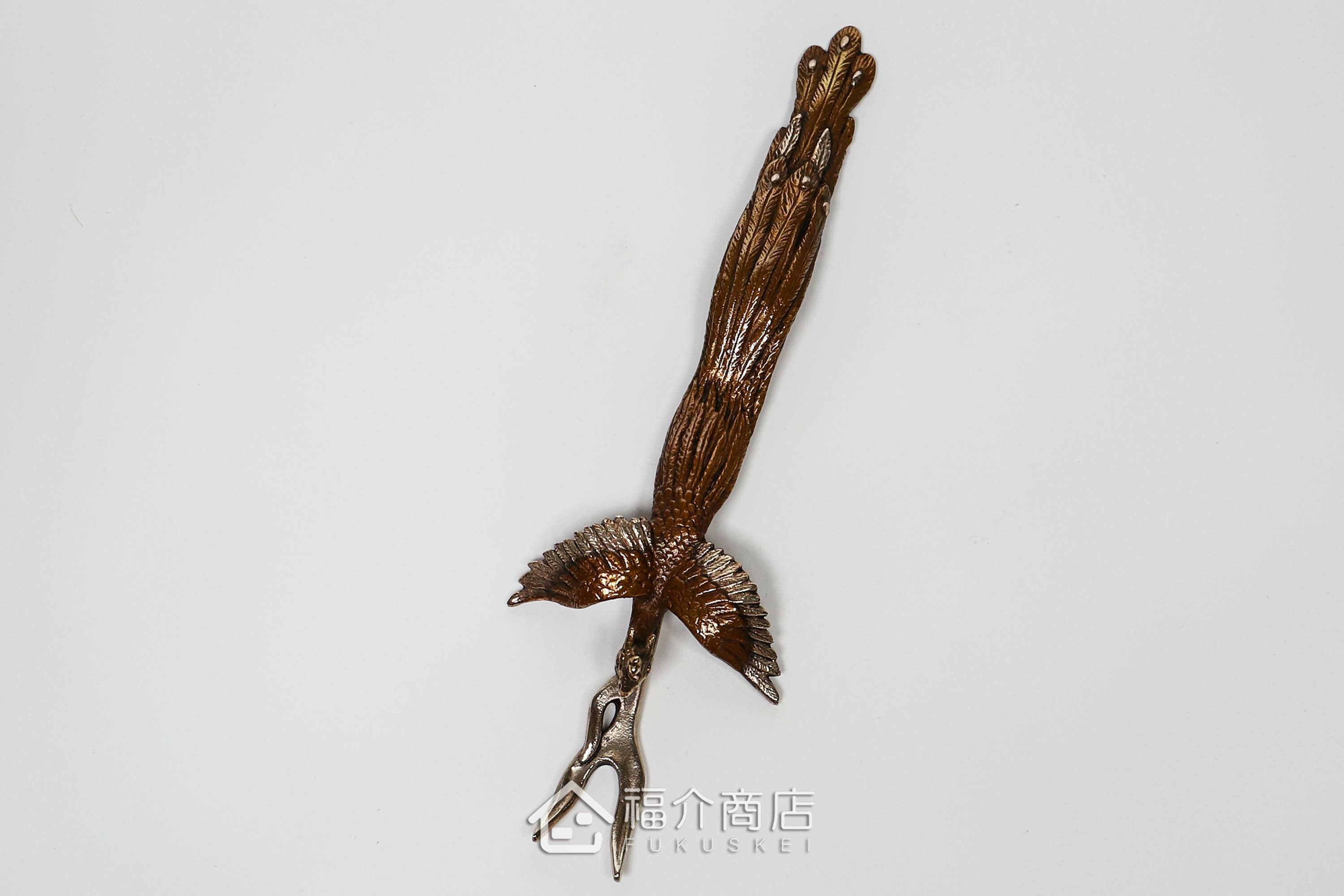 拿起茶壺壺蓋用的蓋取