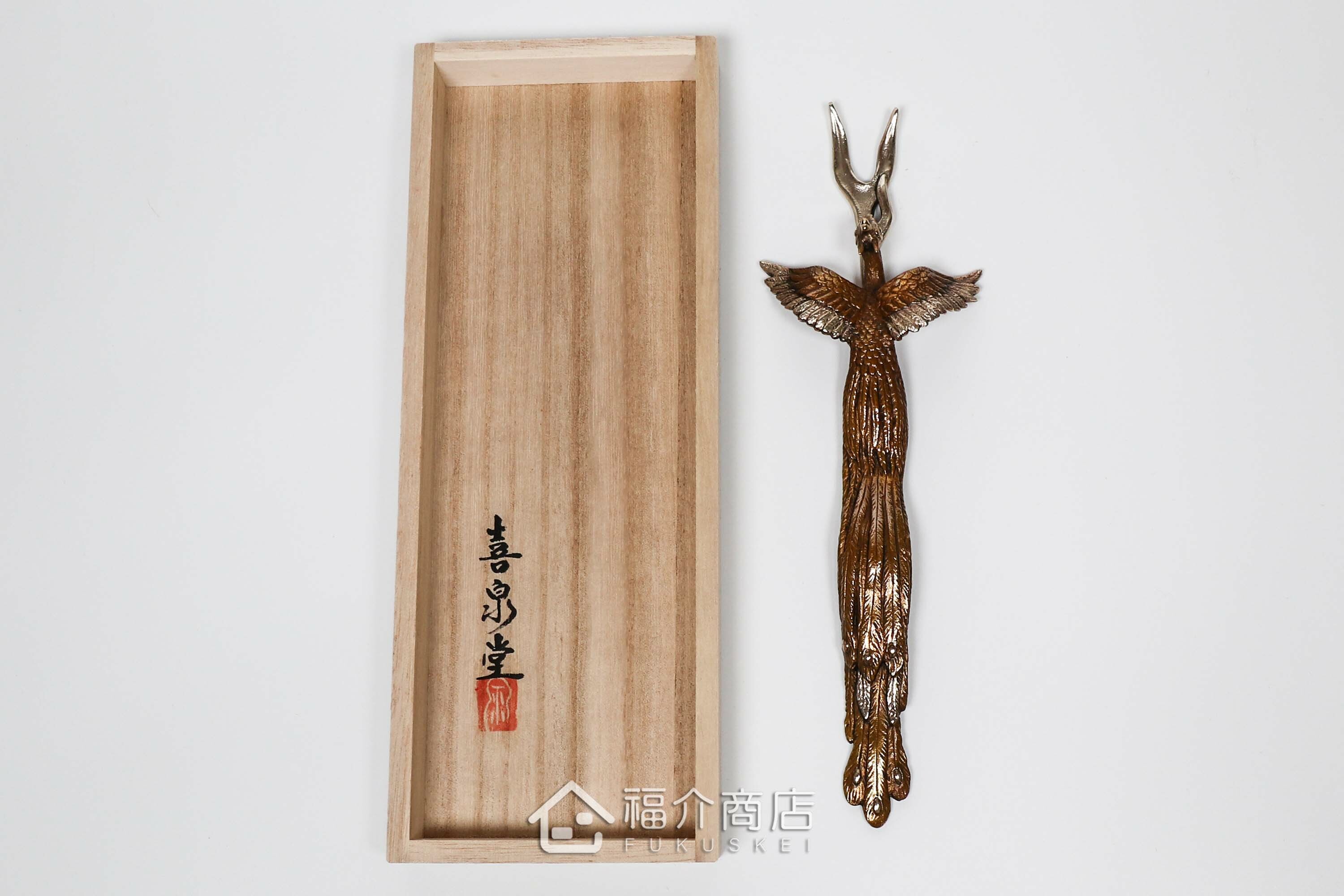 拿起茶壺壺蓋用的蓋取