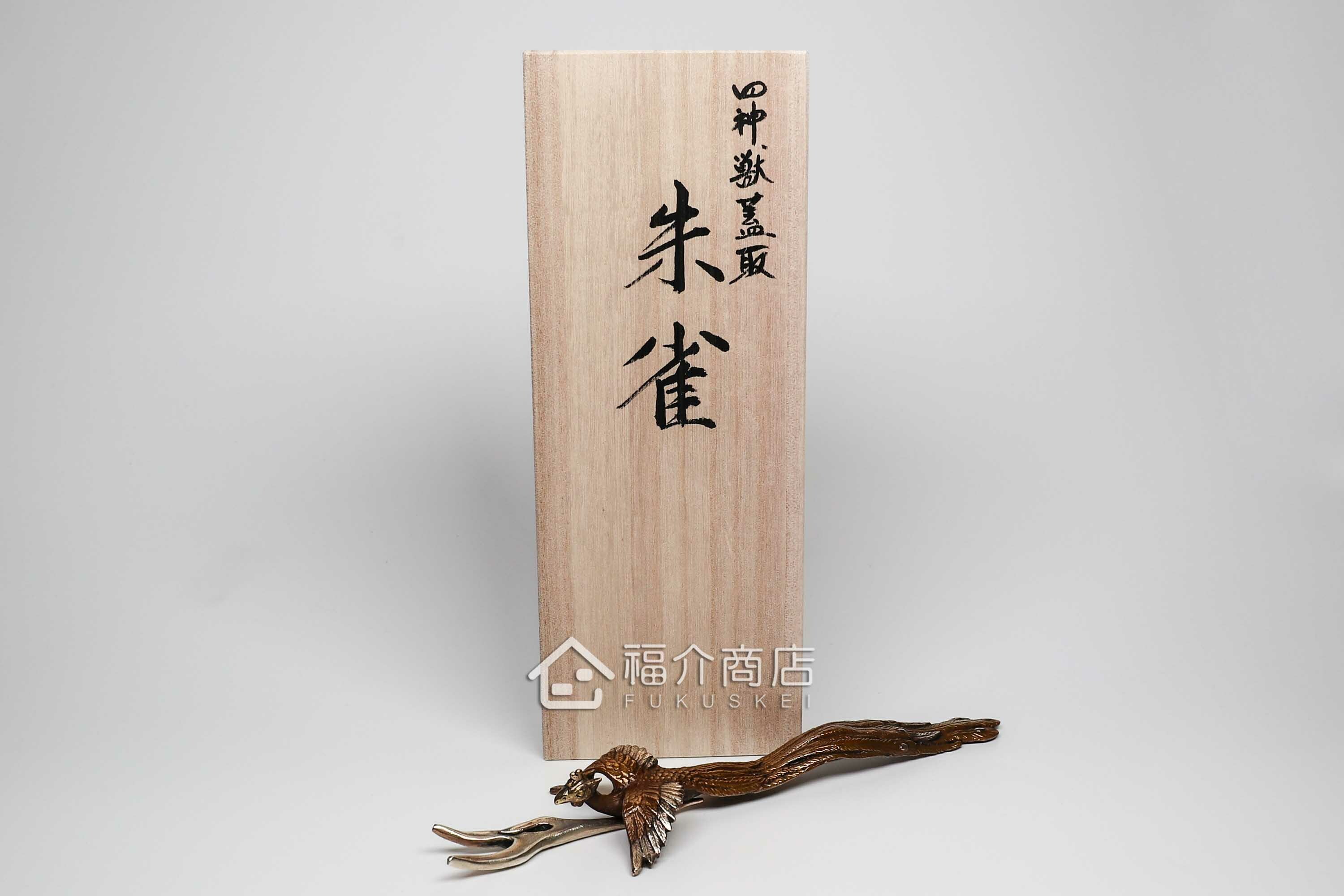 拿起茶壺壺蓋用的蓋取