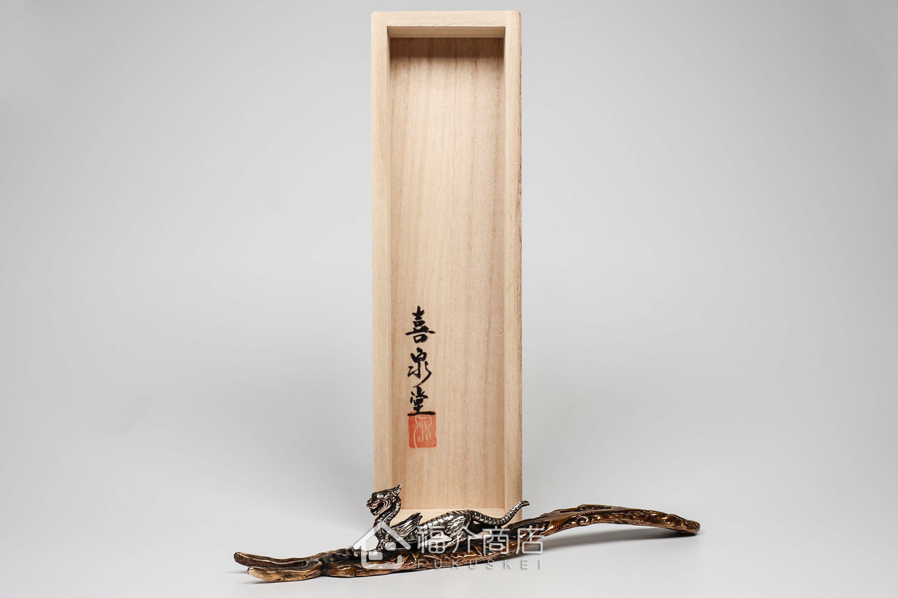 拿起茶壺壺蓋用的蓋取