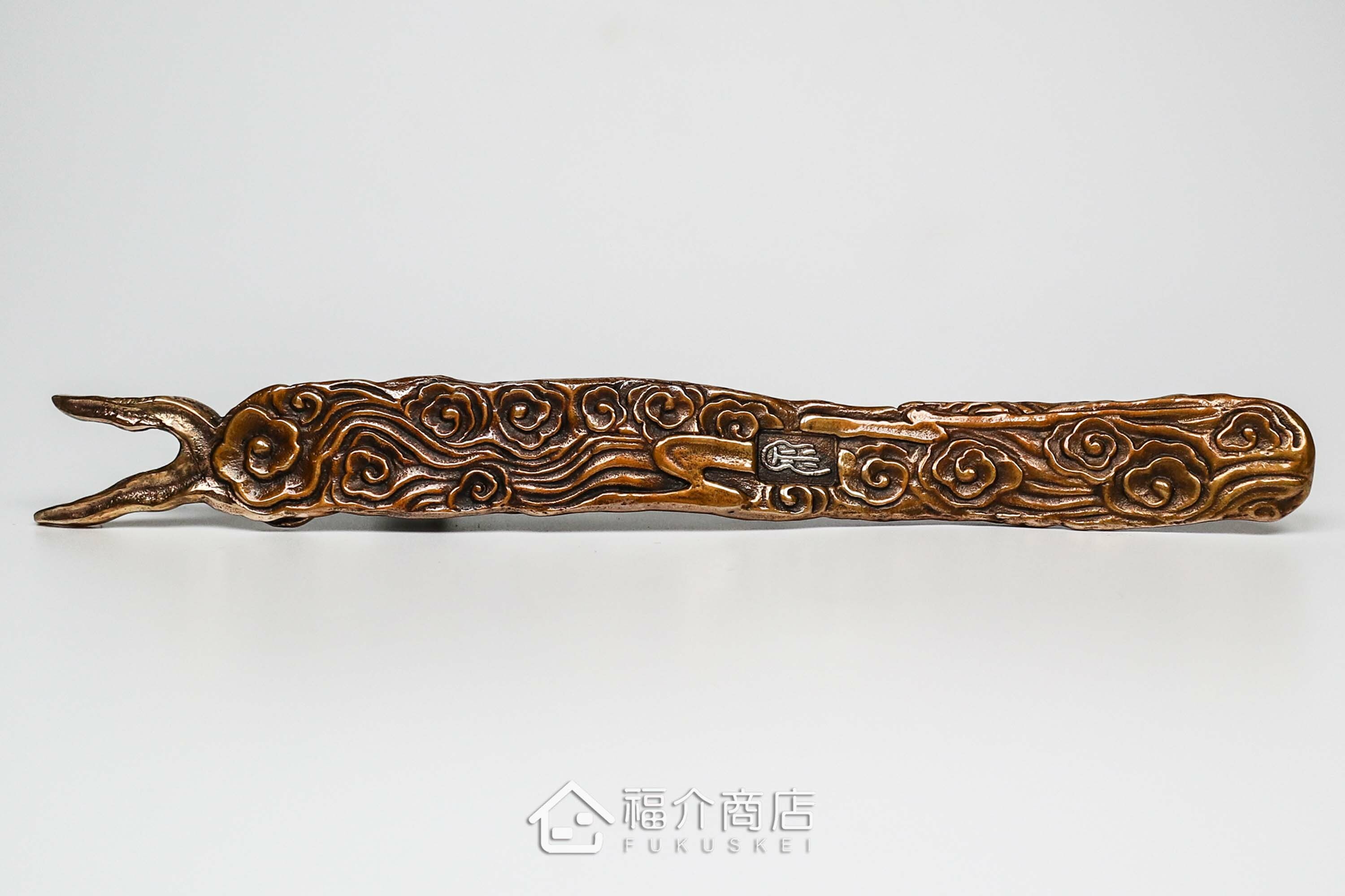 拿起茶壺壺蓋用的蓋取