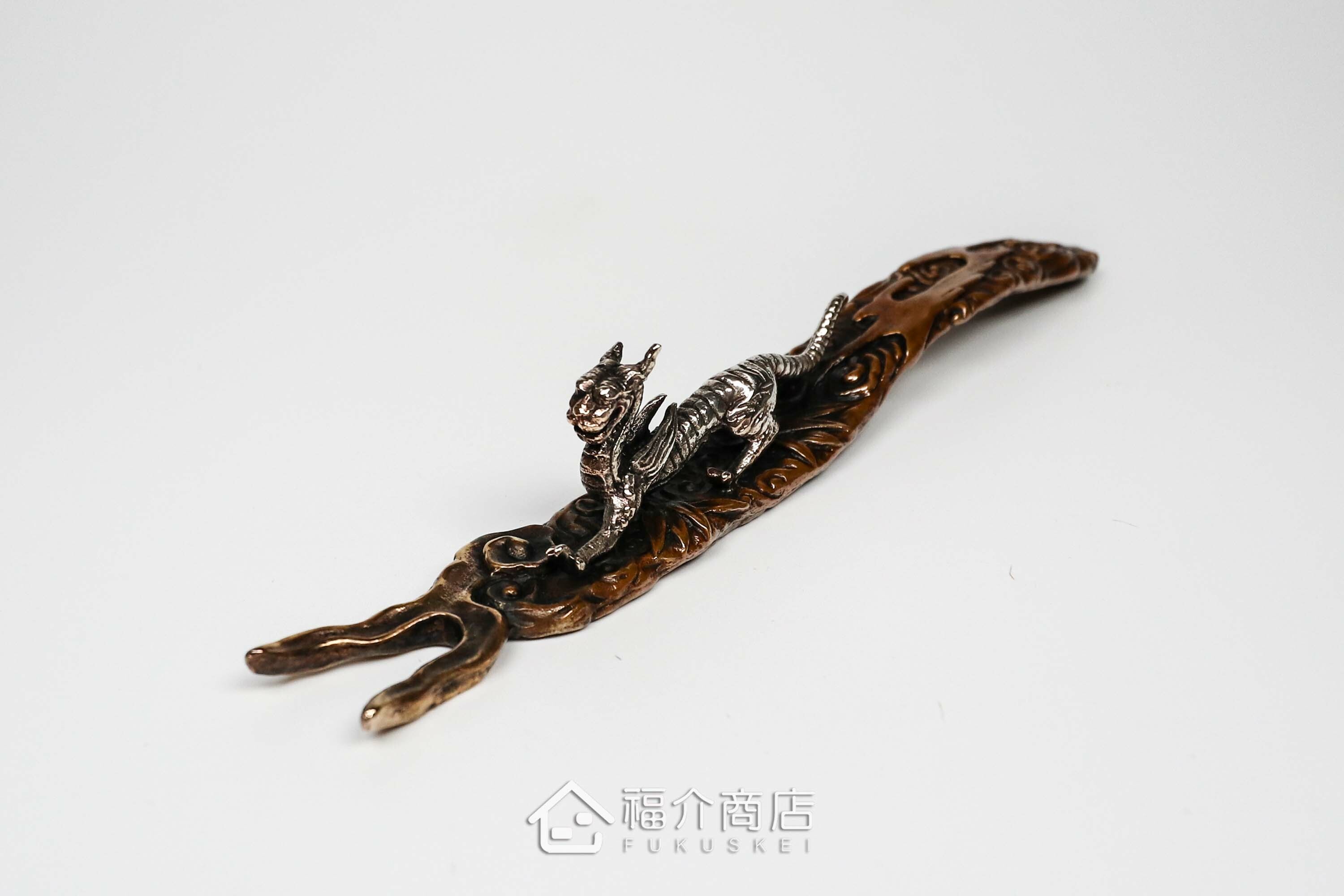 拿起茶壺壺蓋用的蓋取