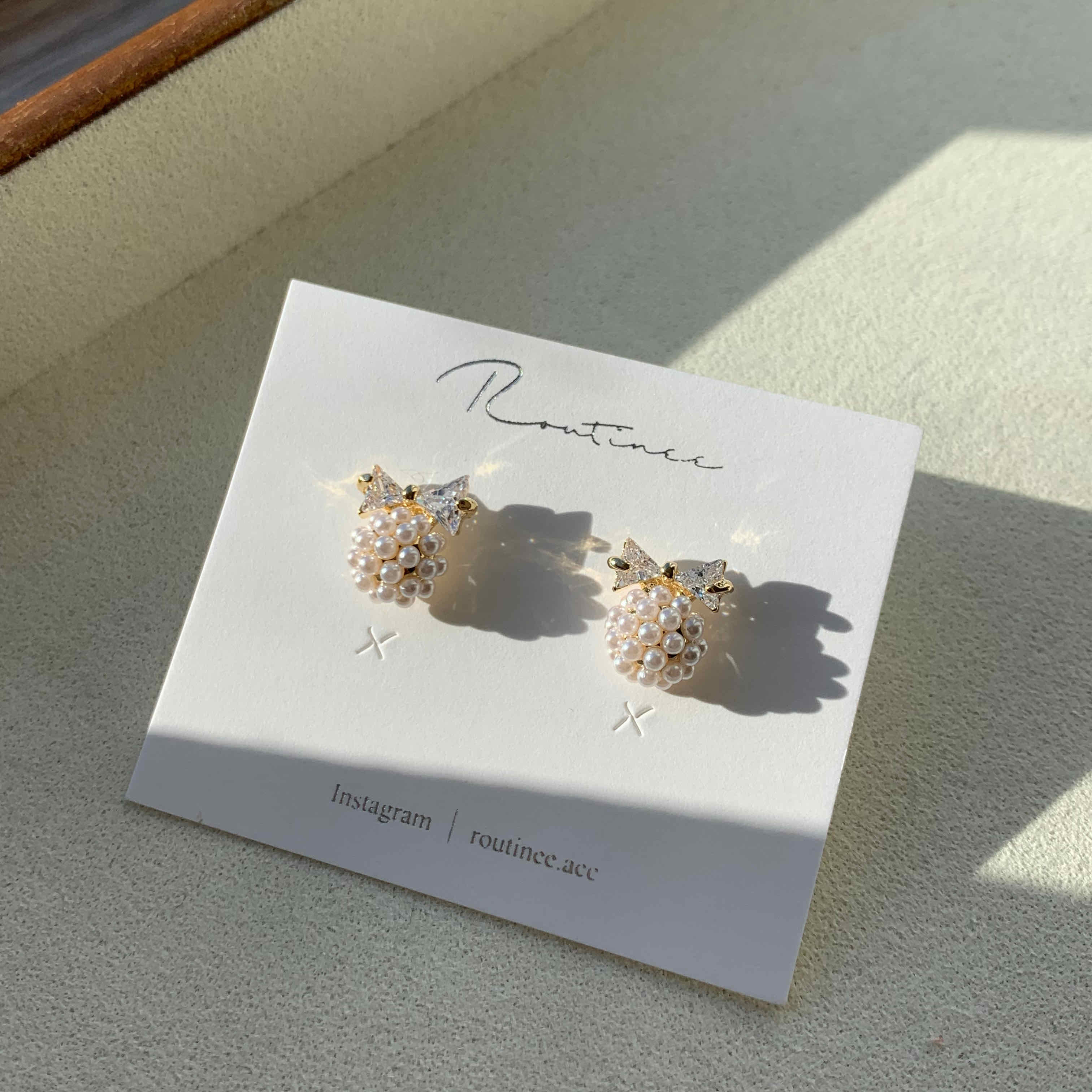 🇰🇷珍珠花球蝴蝶結耳環