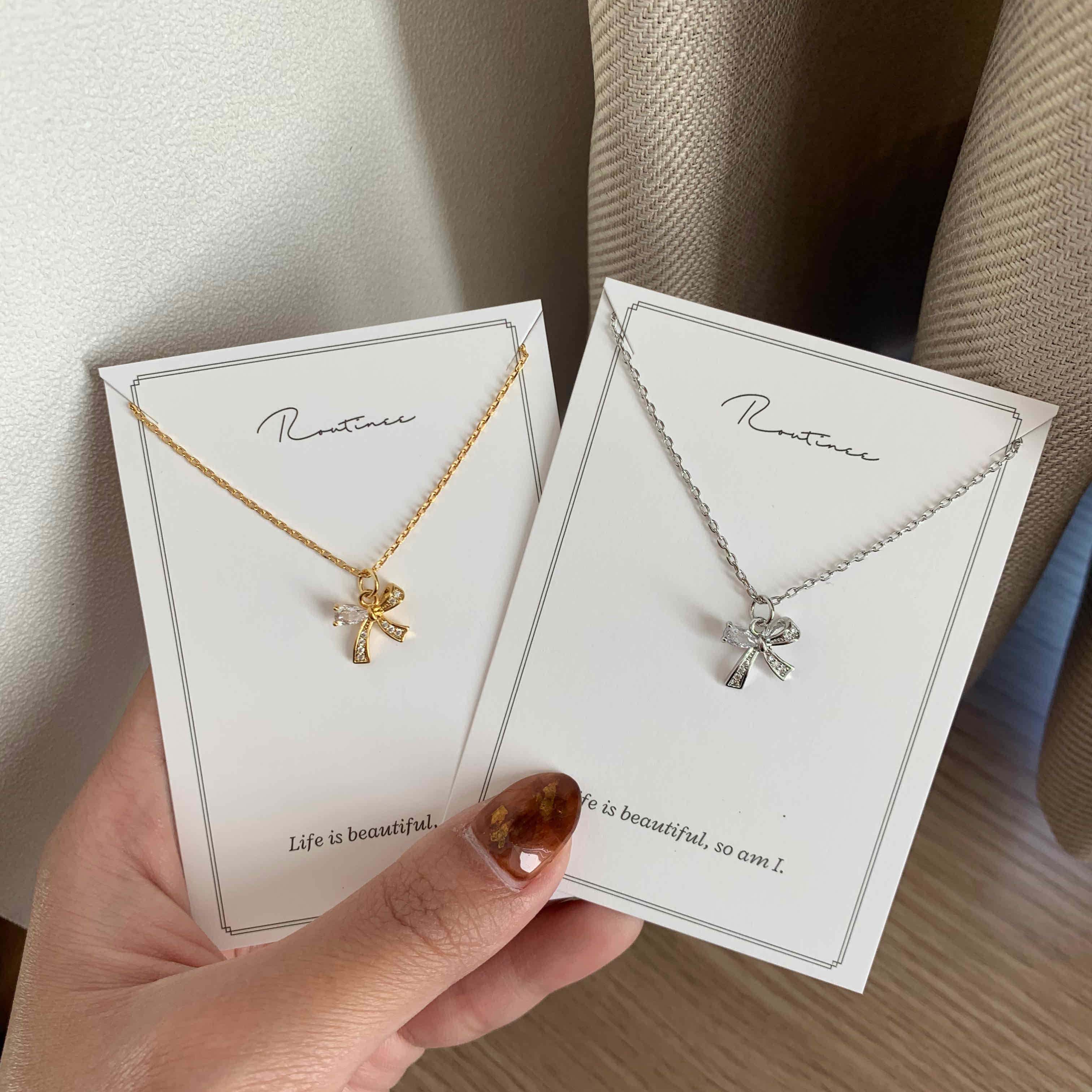 🇰🇷不對稱閃鑽蝴蝶結項鍊｜2 color