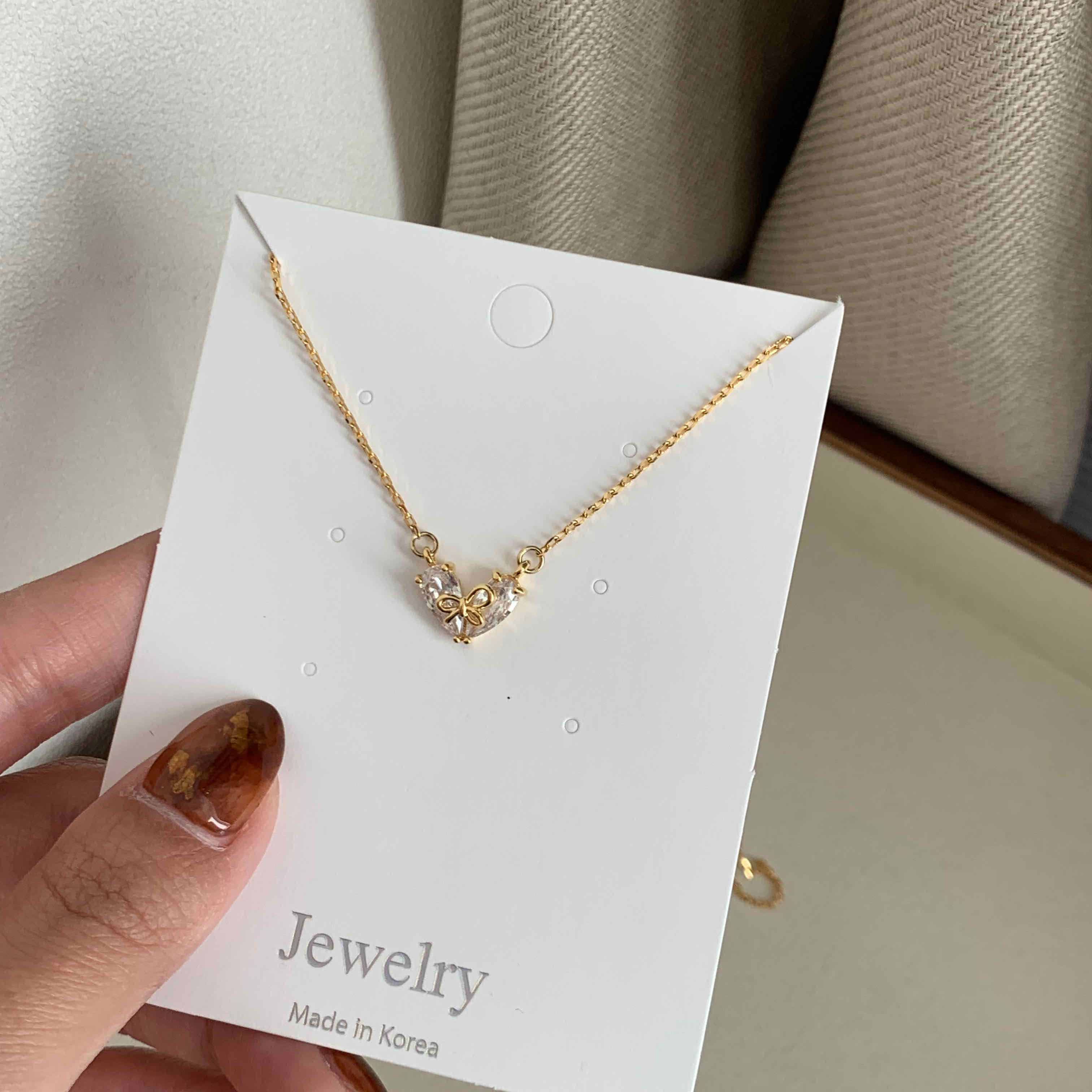 🇰🇷不對稱蝴蝶結愛心閃鑽項鍊