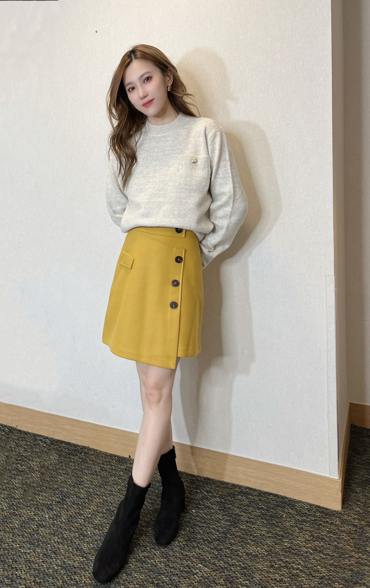 側釦不規則下擺A字裙