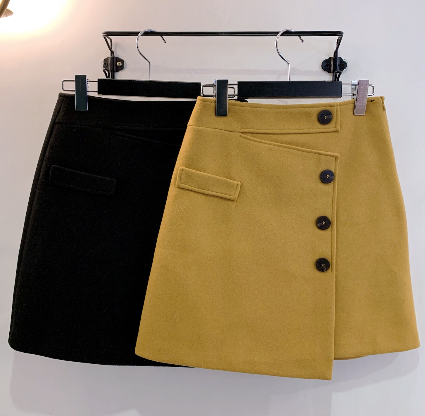 側釦不規則下擺A字裙