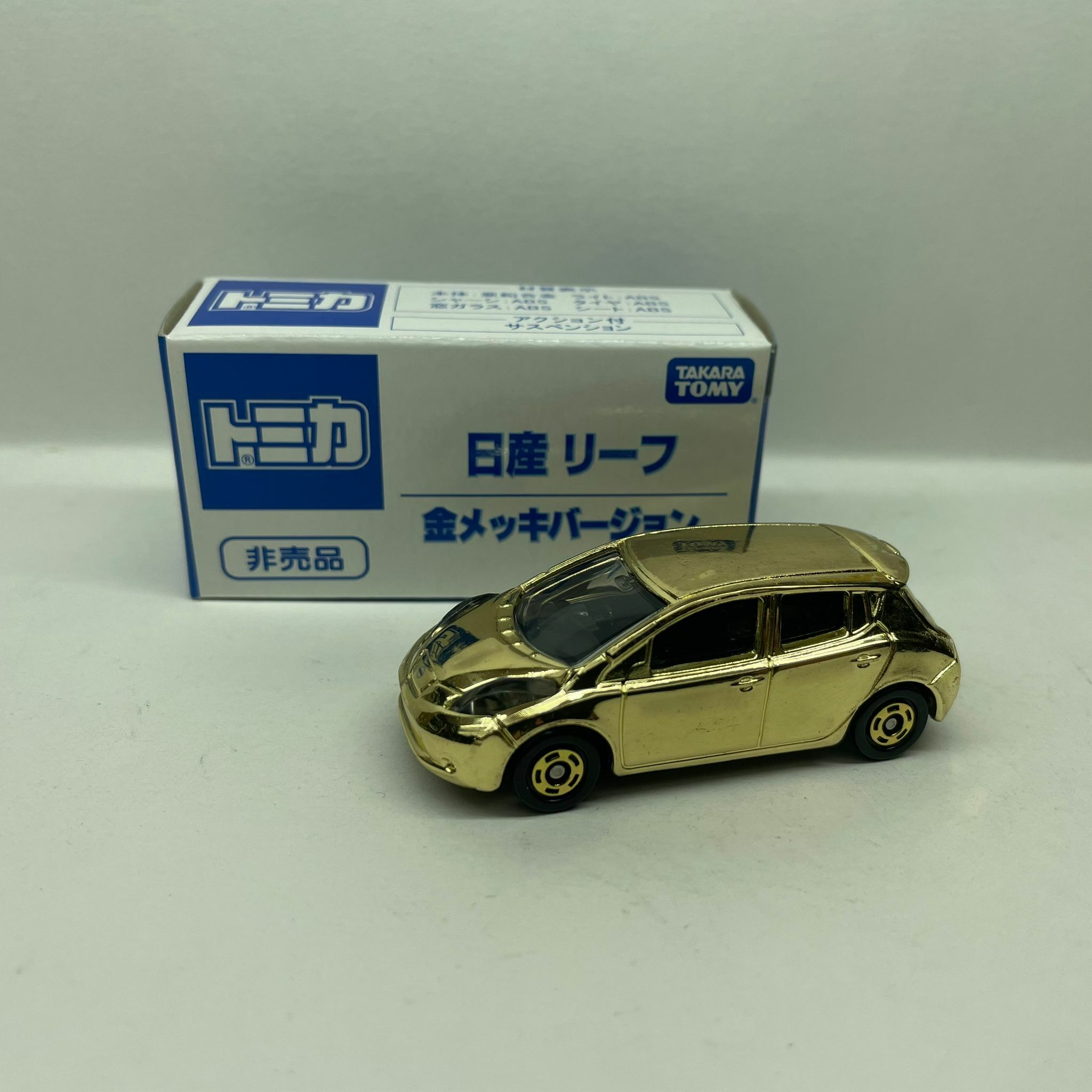 Tomica Nissan Note Chrome Gold