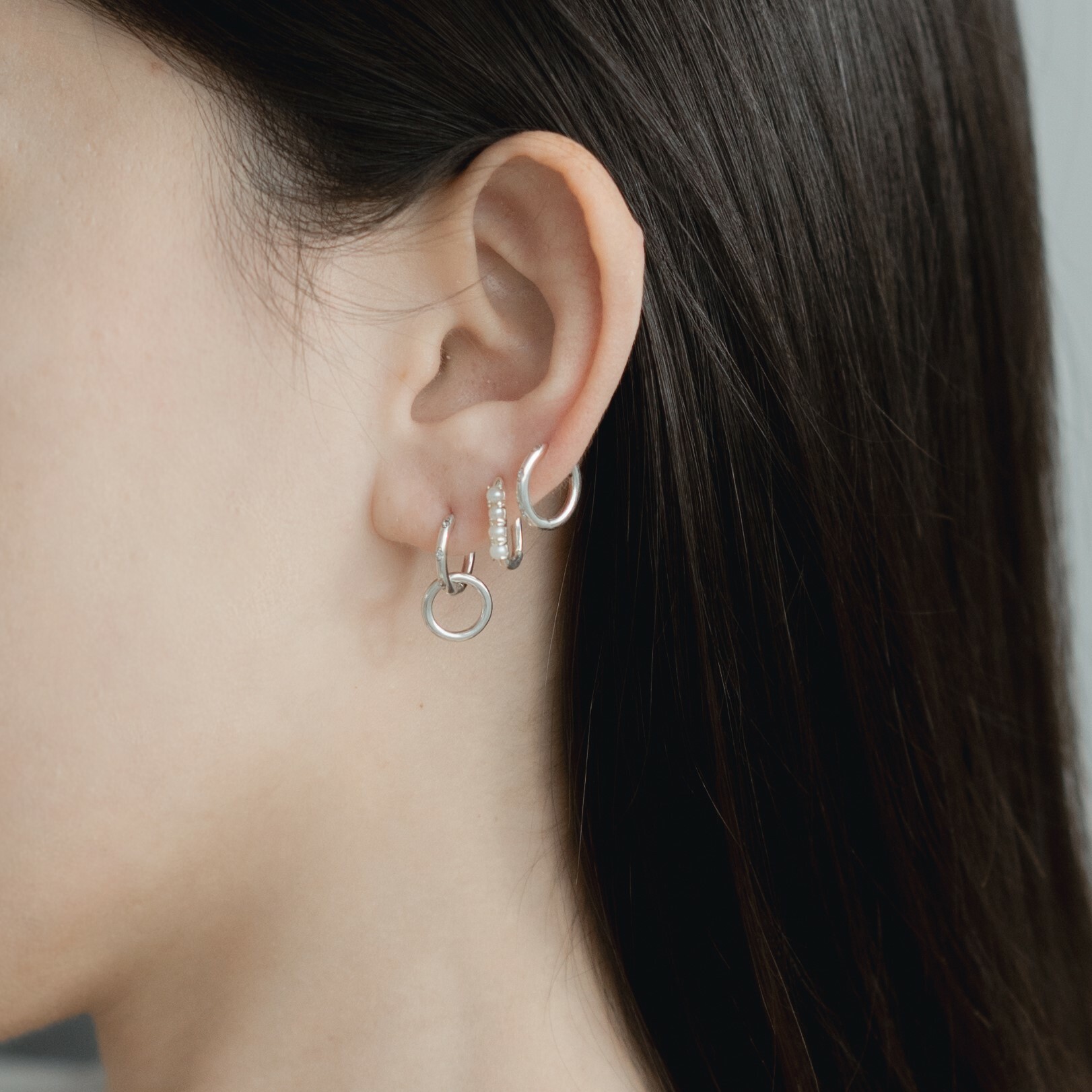 Four pearl square huggie