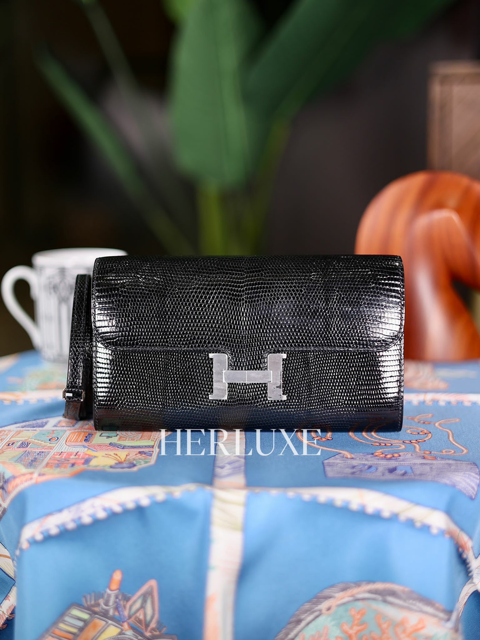 Constance to go 89 noir ck lezard niloticus lisse