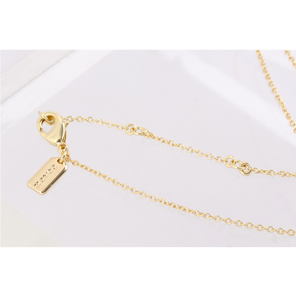 【COACH】Disney x Coach 反派圖案愛心綴飾項鍊(金色) CD814 GDRD