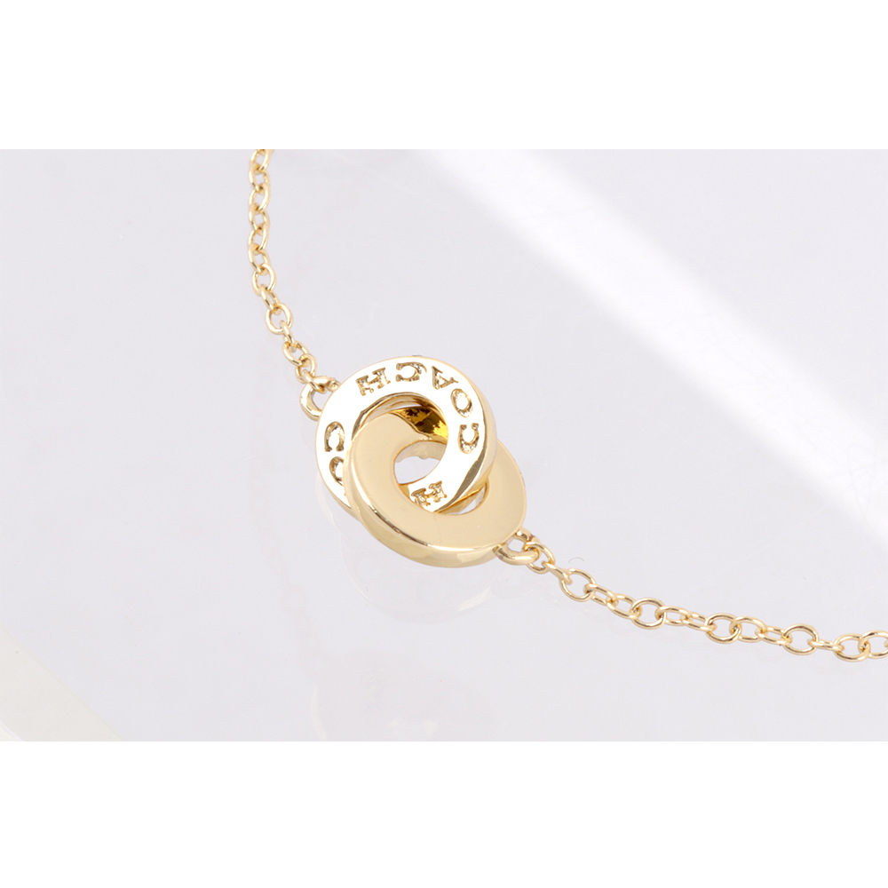 【COACH】水鑽及玻璃珍珠連扣圓圈可調式手鍊(金色) CO232 VP4