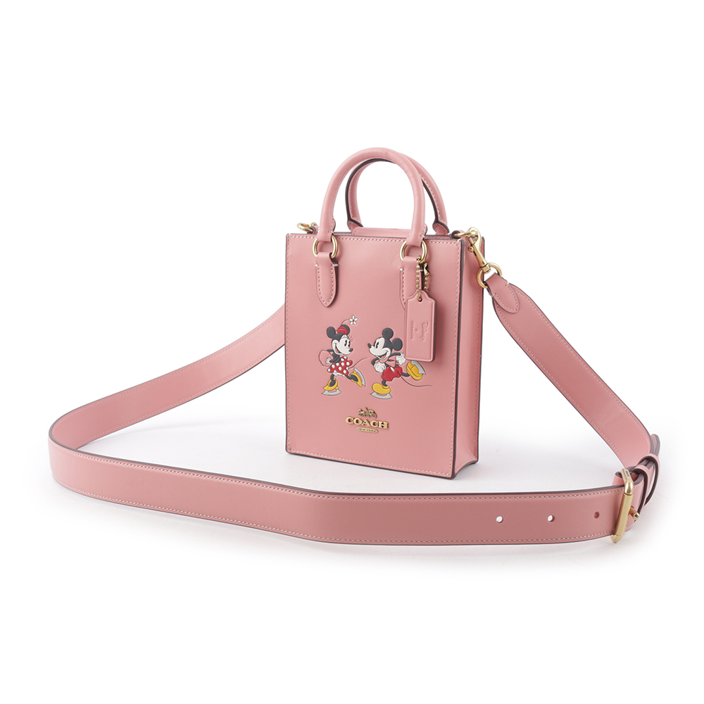 【COACH】Disney X Coach 米奇米妮溜冰圖案迷你二用琴譜包(淺腮紅粉) CN023 B4OFE