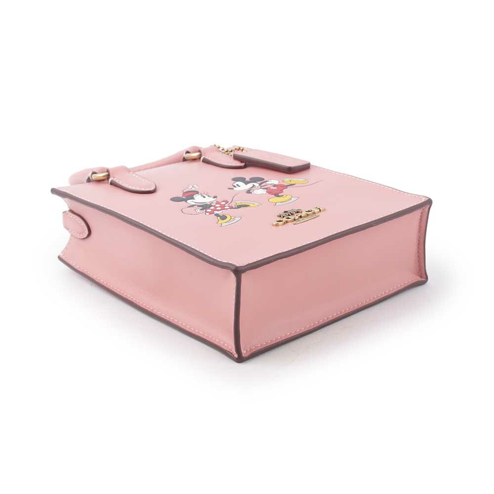 【COACH】Disney X Coach 米奇米妮溜冰圖案迷你二用琴譜包(淺腮紅粉) CN023 B4OFE