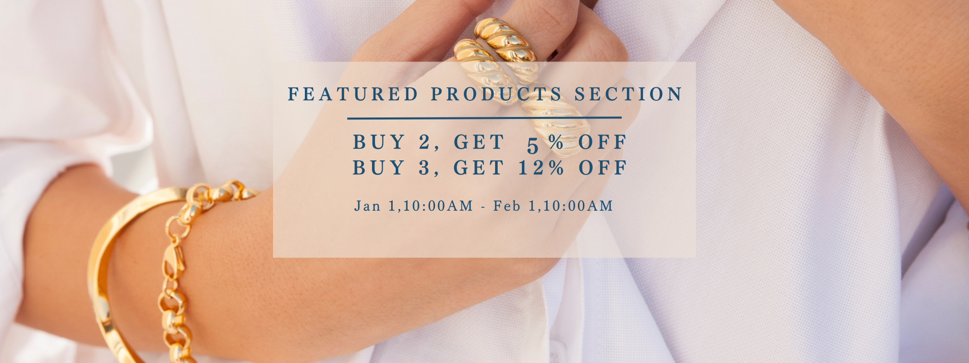 a young thin woman wearing a whote shirt and wearing gold rings and bracelets