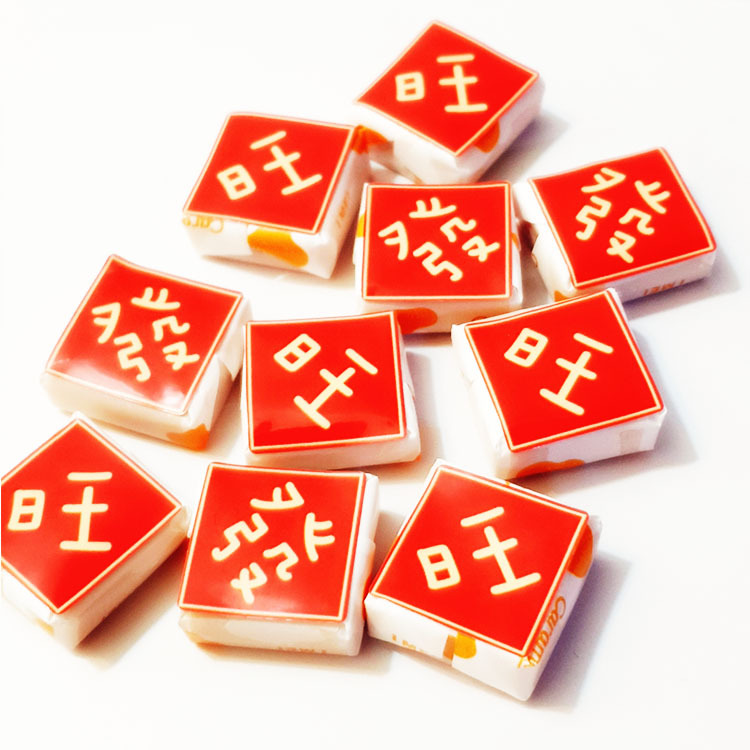 創意小春聯義美牛奶糖,過年糖果