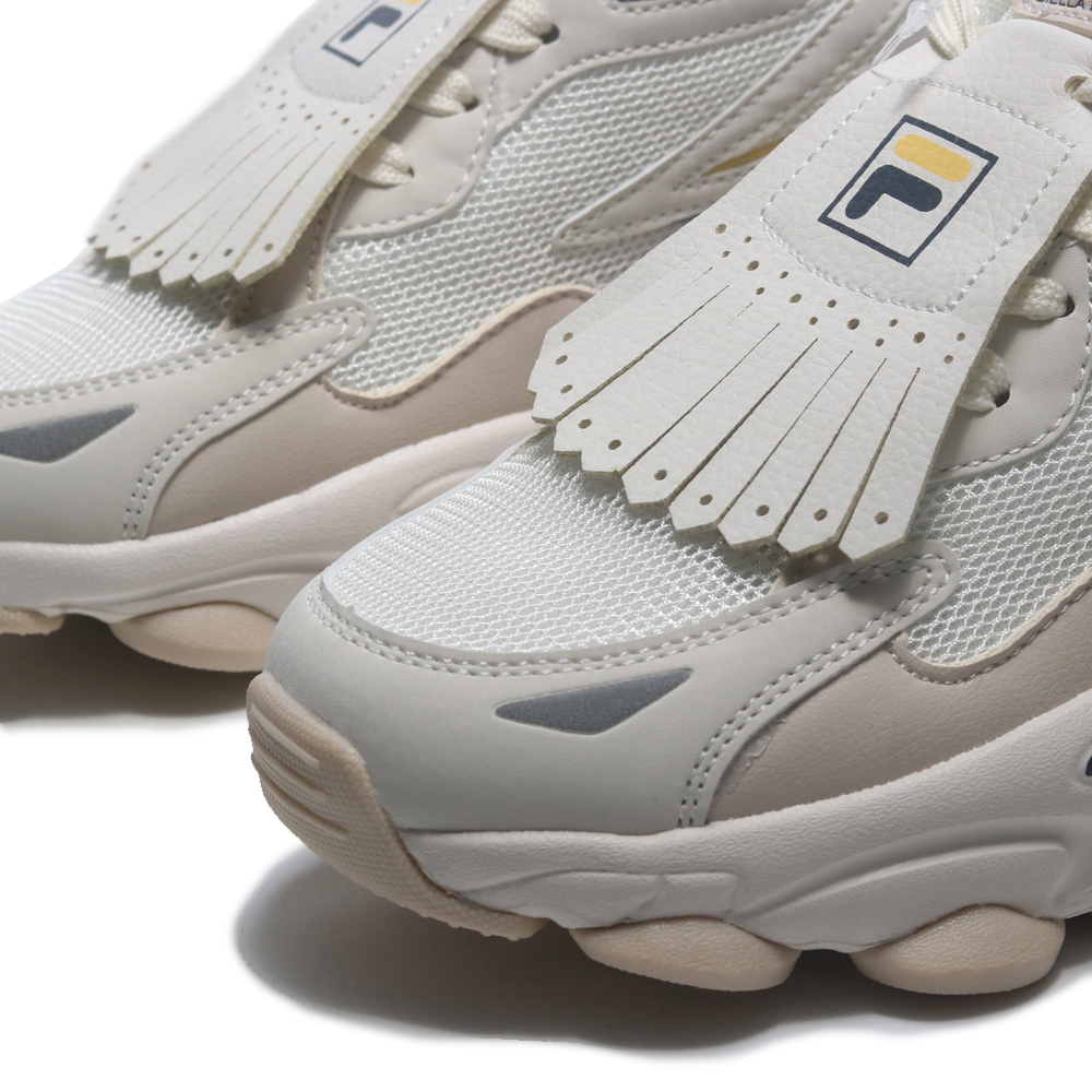 【下殺↘ $1290】FILA 休閒鞋 奶油黃藍 流蘇 小背包 老爹鞋 女 5J318Y793