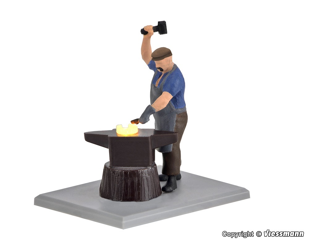 Viessmann 1514 HO scale Blacksmith with glowing iron, moving