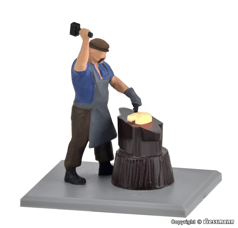 Viessmann 1514 HO scale Blacksmith with glowing iron, moving