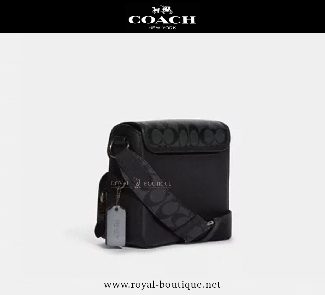 COACH 經典老花紋相機包