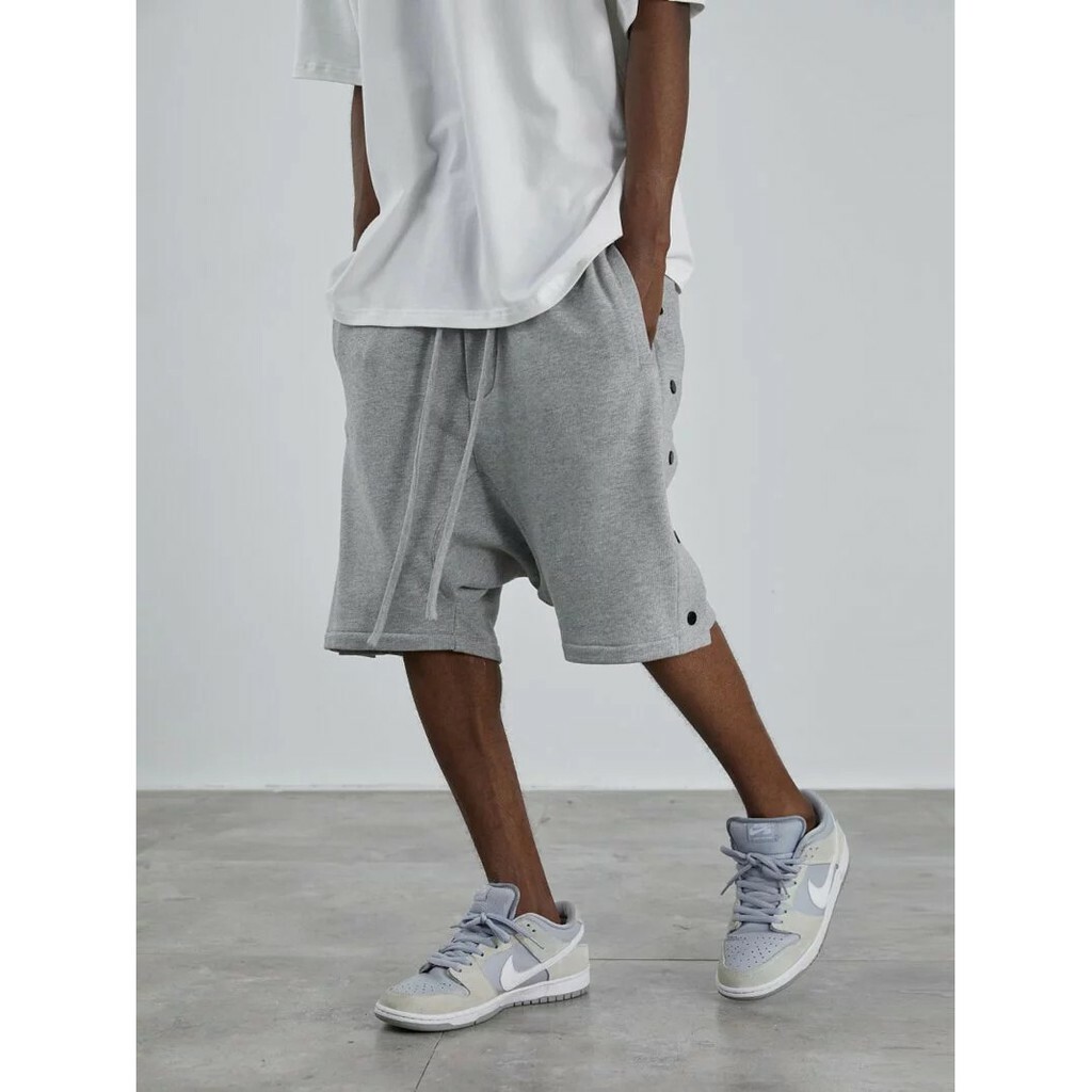 Harsh and Cruel 21SS 排扣低檔抽繩飄帶針織運動短褲 HM212060137