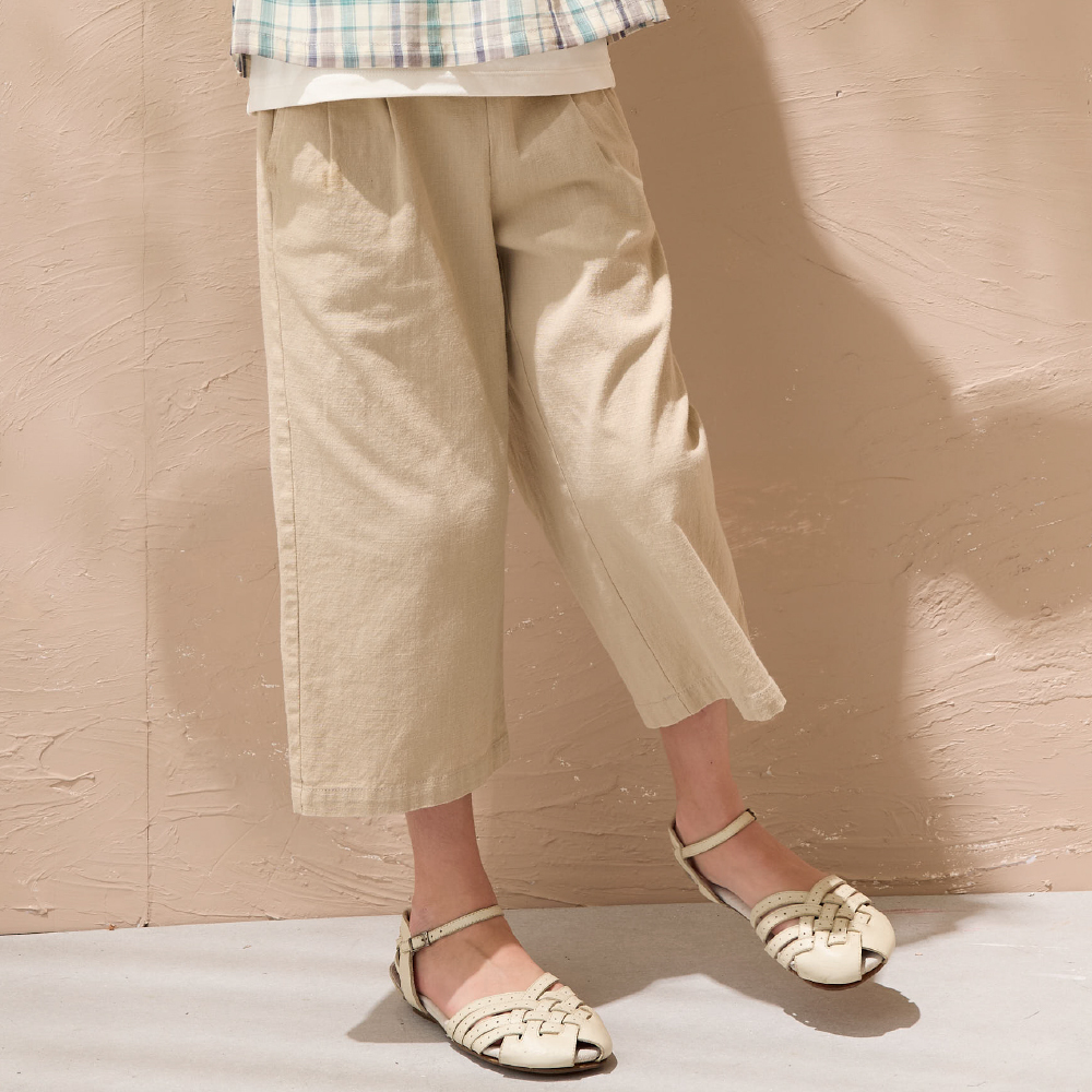 PIPPY 氣質款剪接壓摺棉質寬版7分褲 卡其