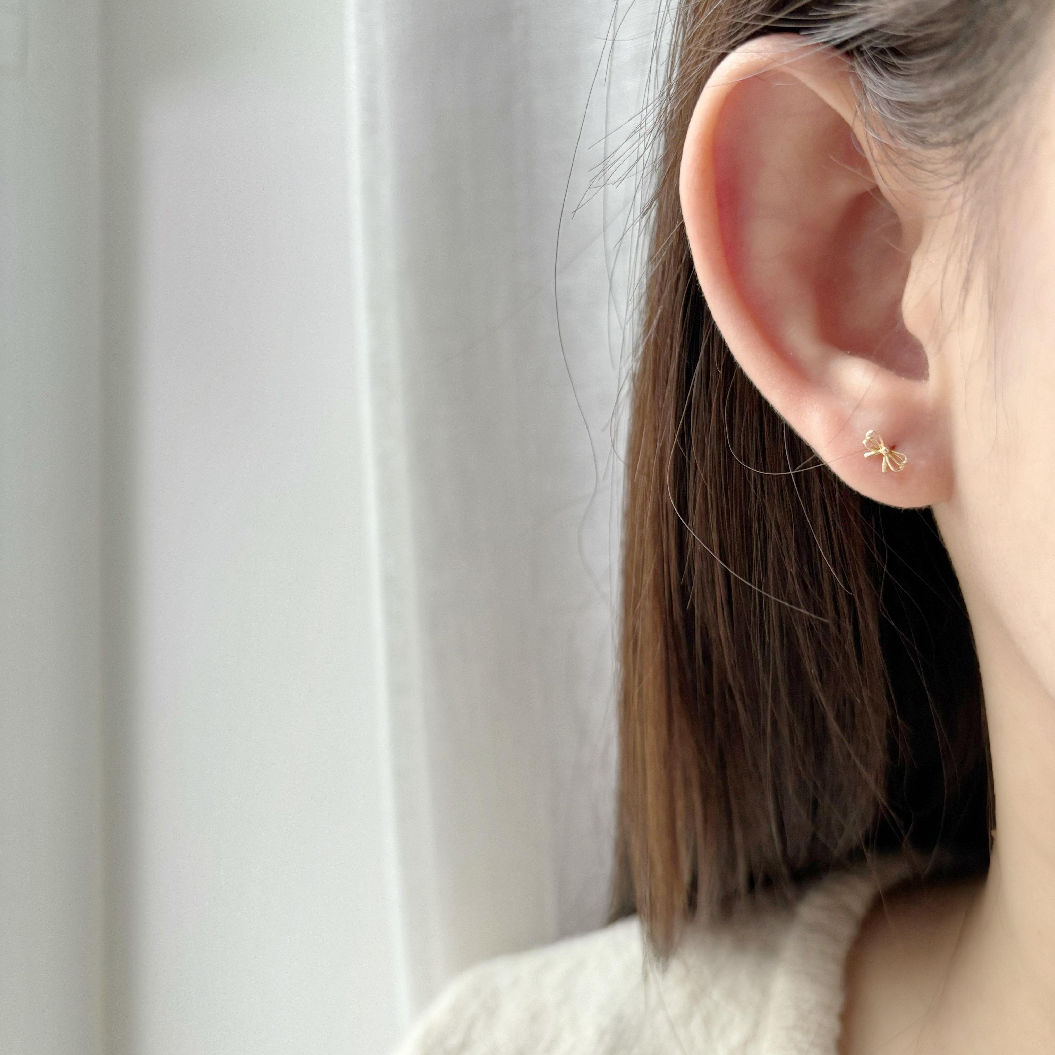 14K細緻簍空蝴蝶結轉珠耳環