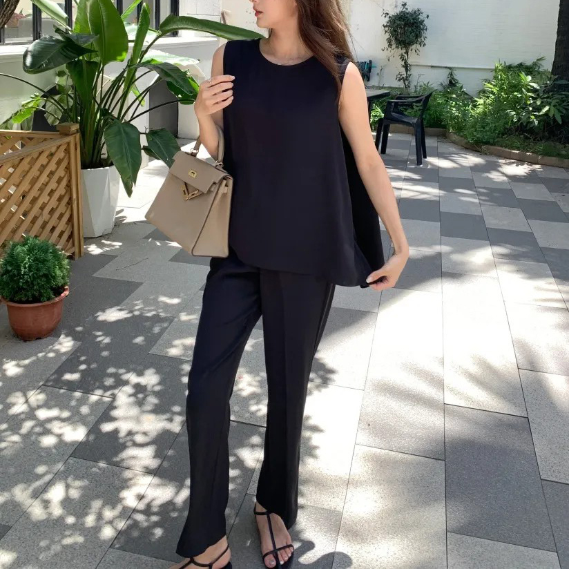 時髦黑色傘擺背心上衣+同色系長褲SET (Elegant & Love)