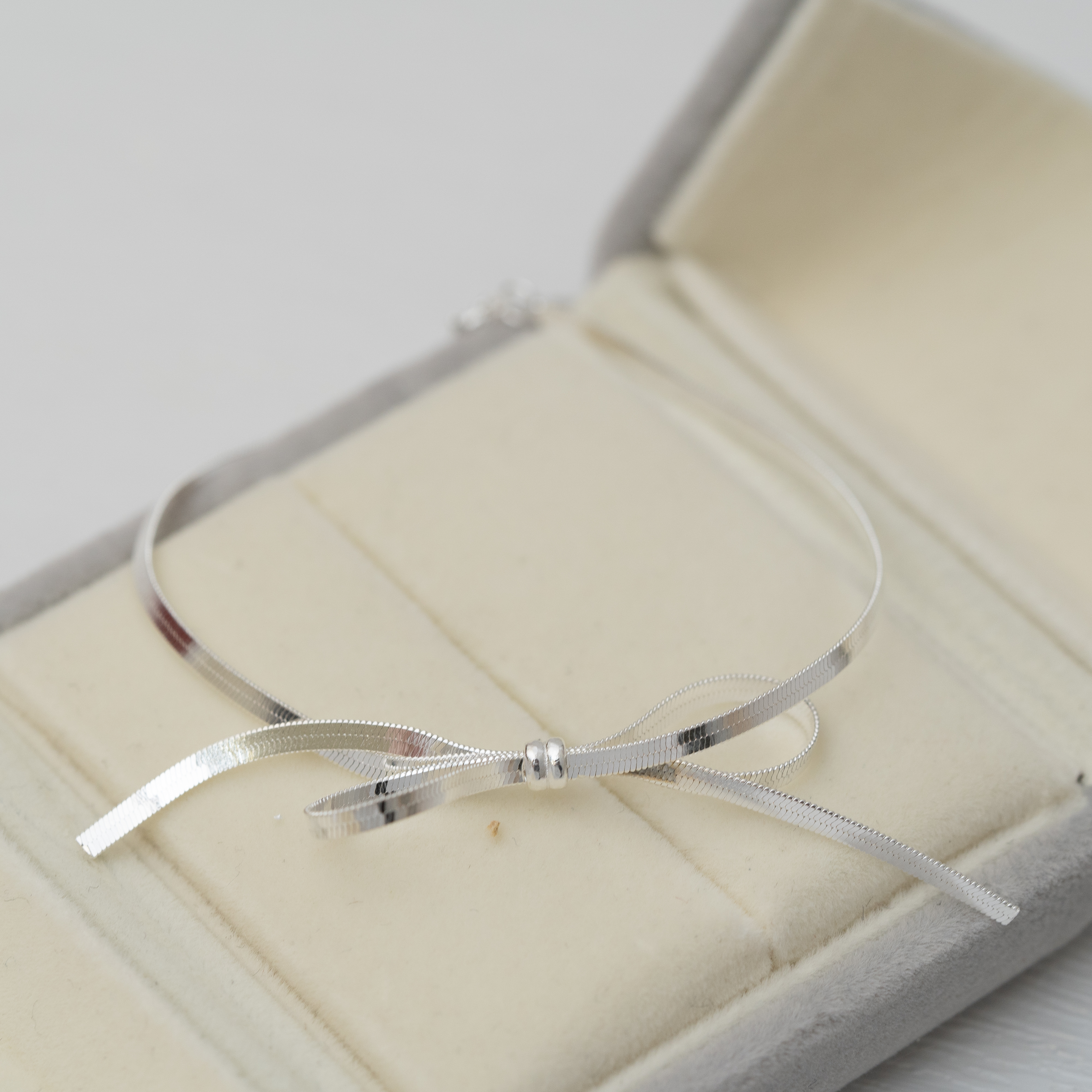 尾骨蝴蝶結手鏈