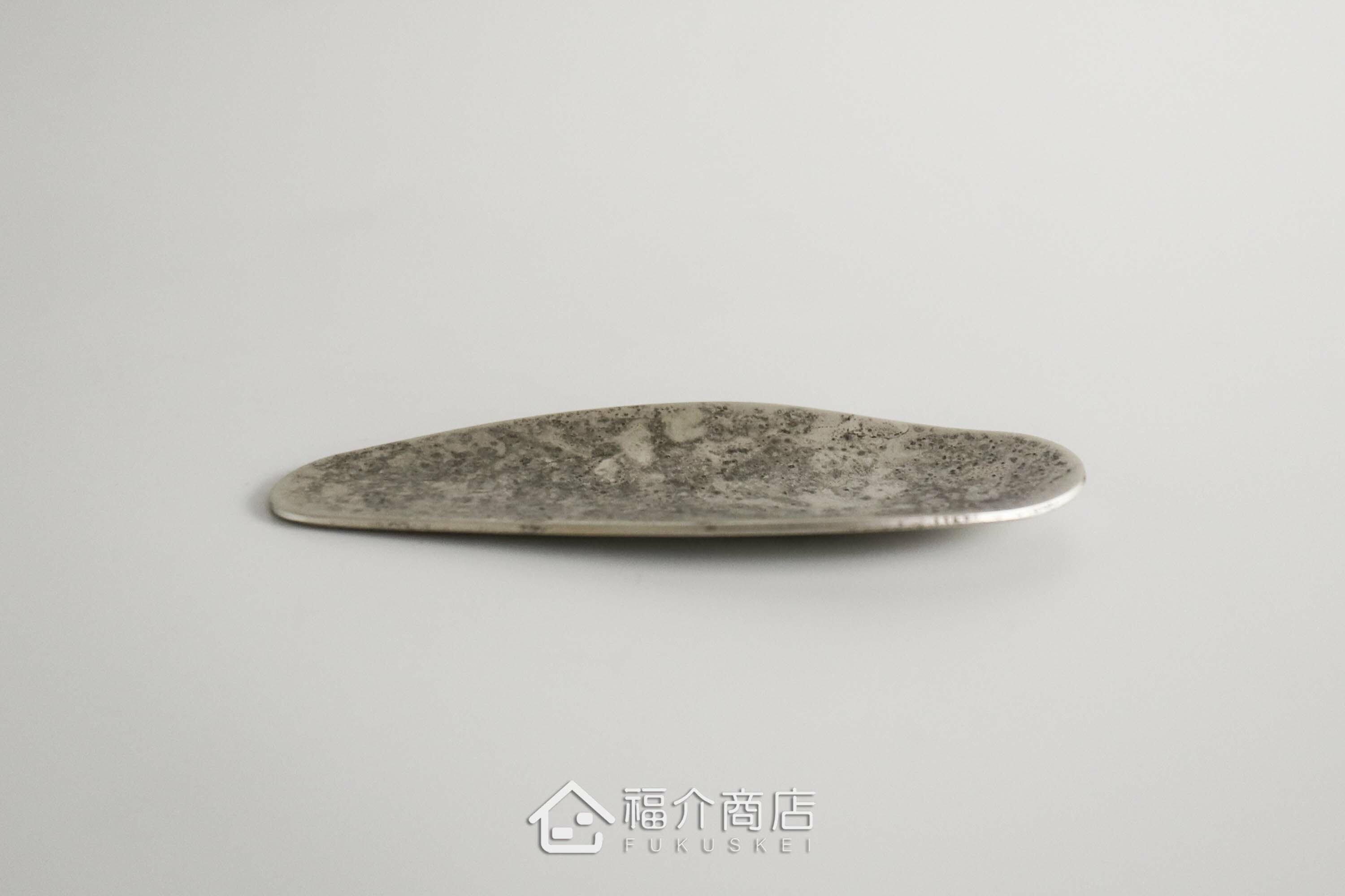 用於把茶罐中的茶葉量取出來的銅製茶則