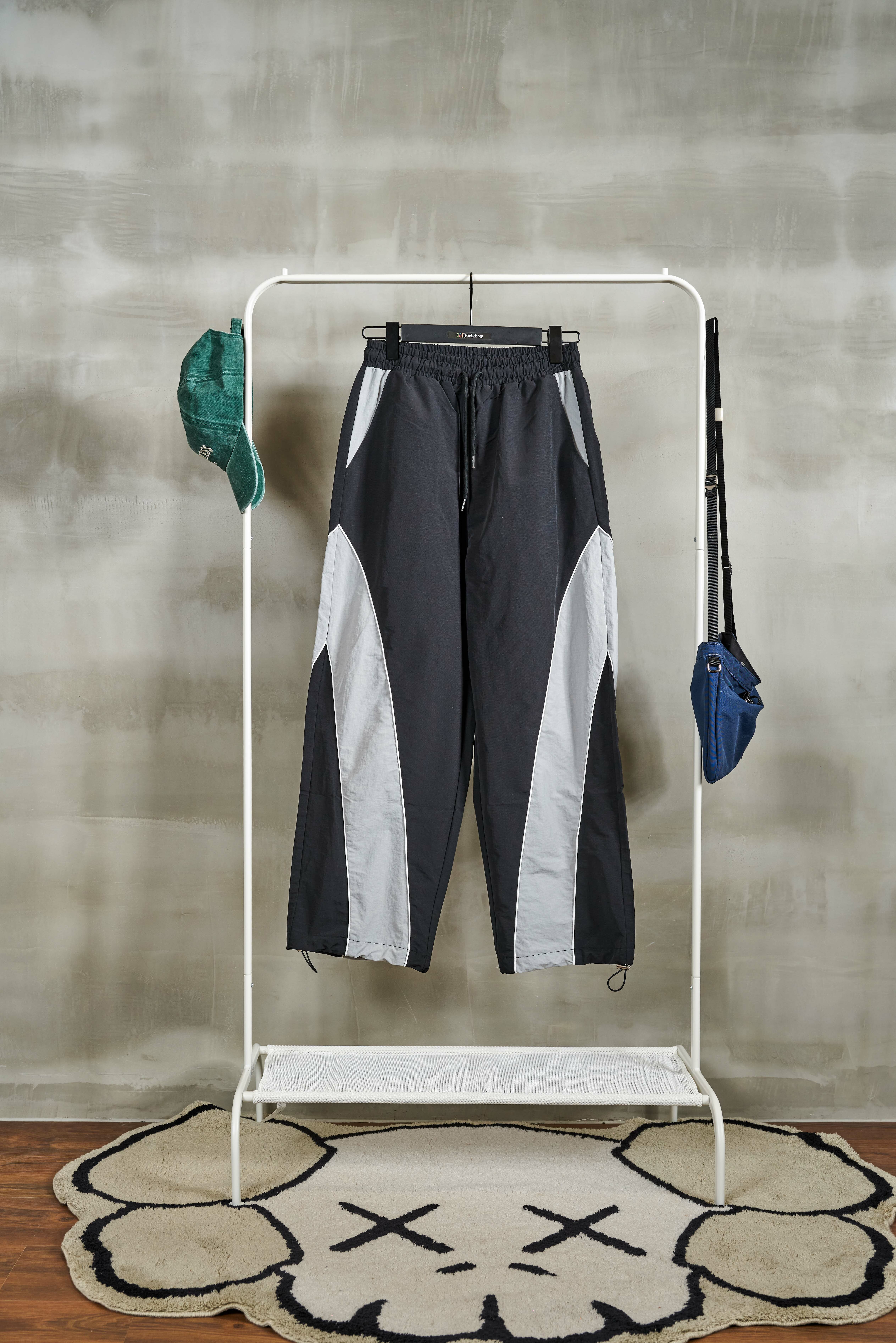 滾邊裁片尼龍長褲