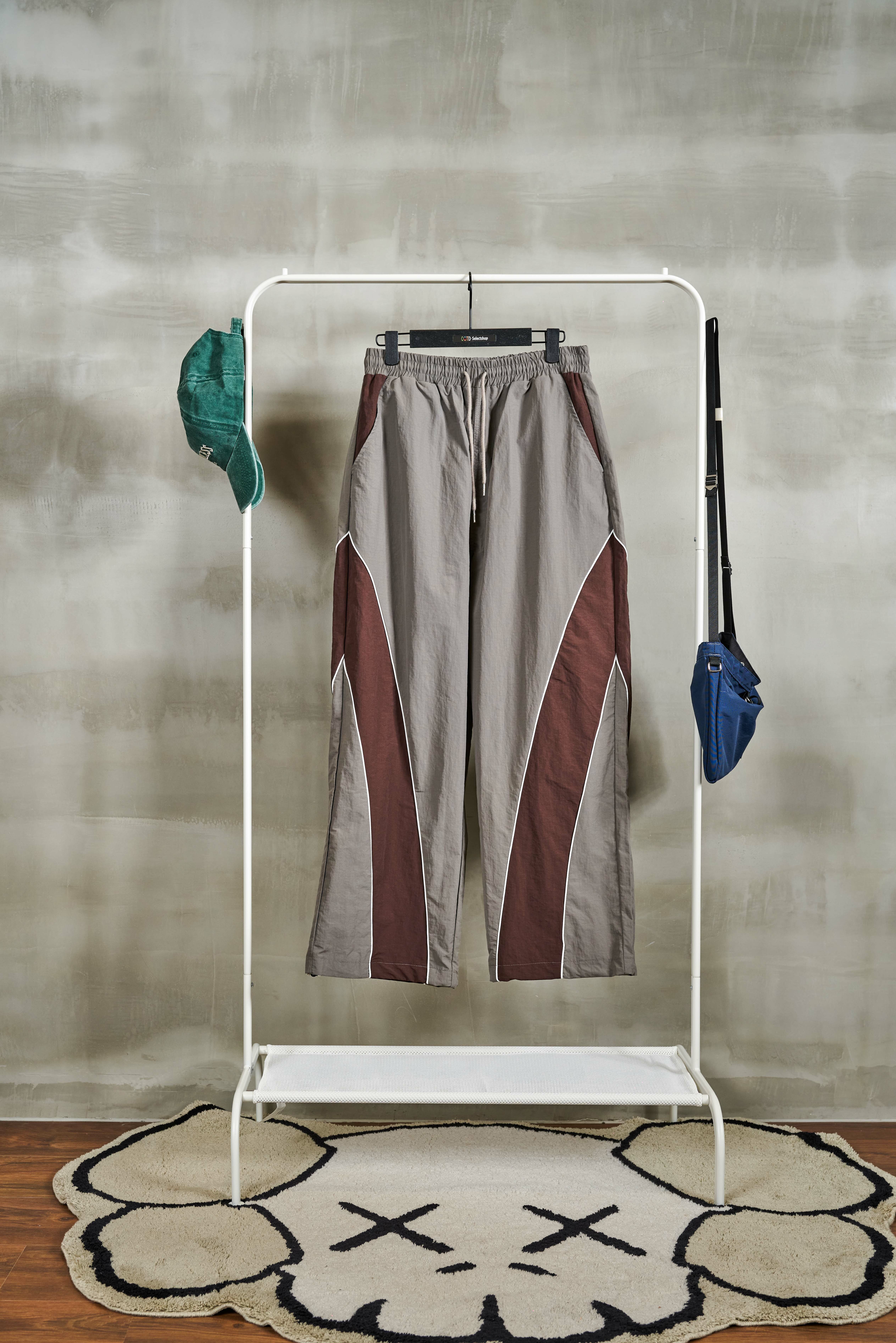 滾邊裁片尼龍長褲