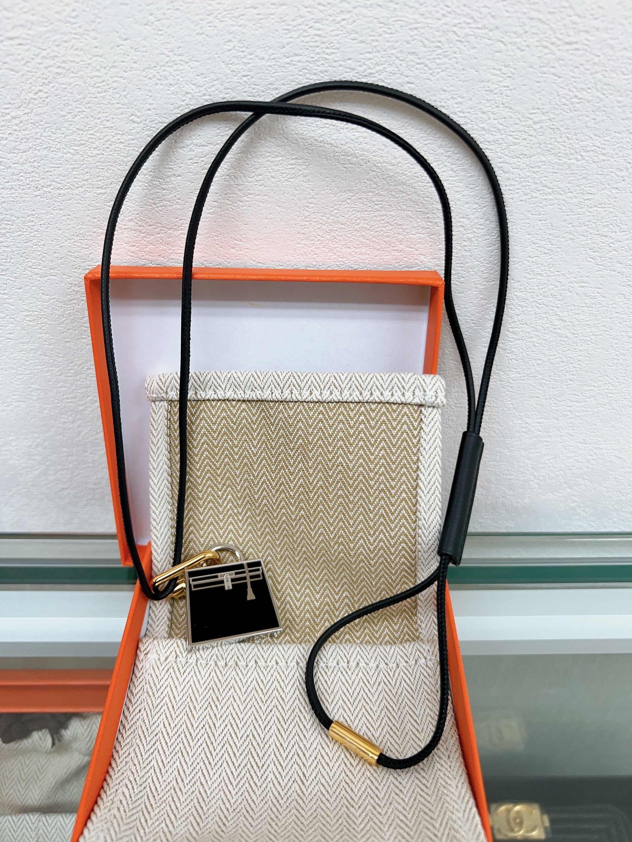 Hermes strap pendant