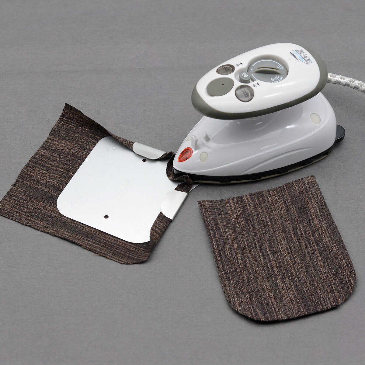 可熨燙弧形平整器