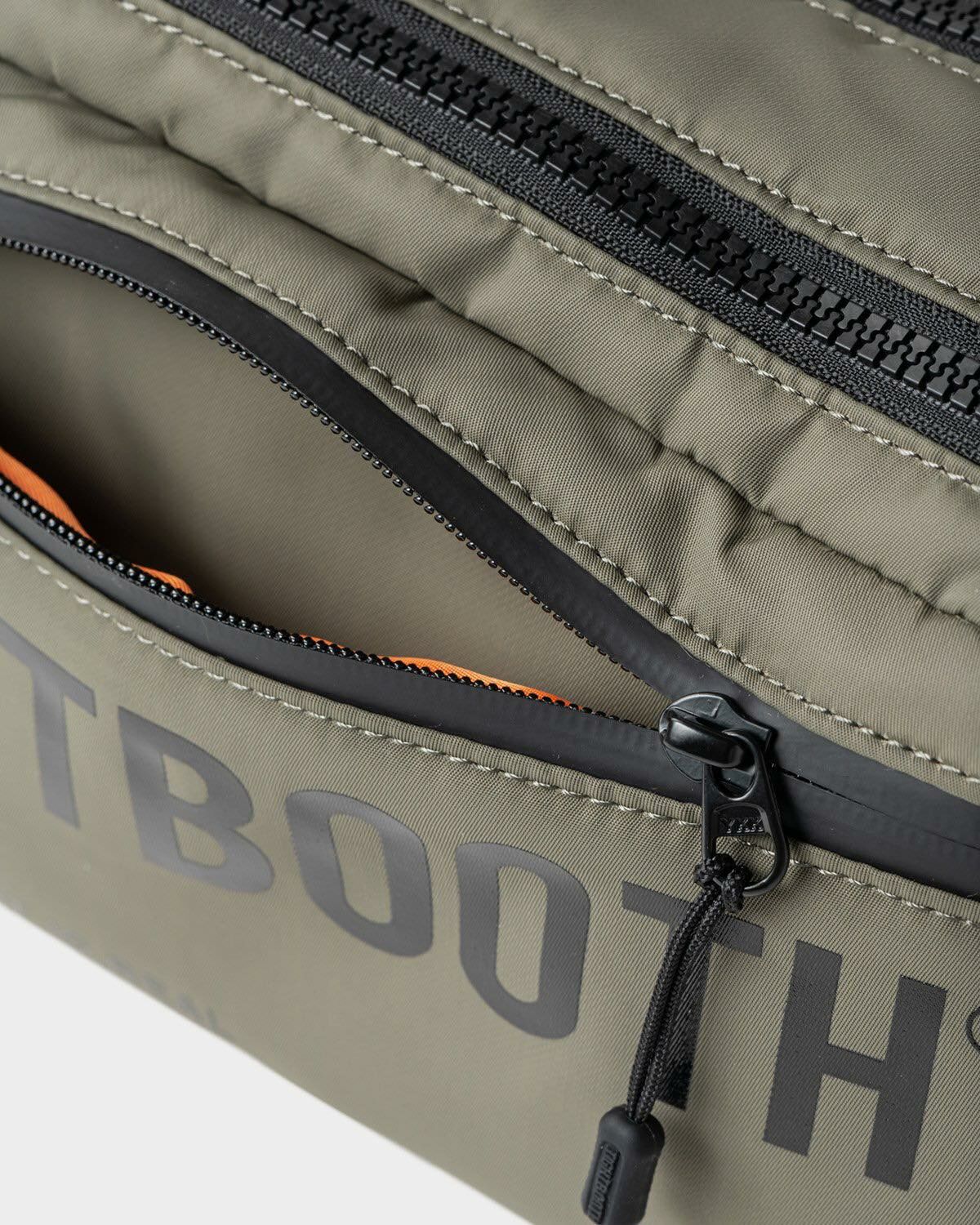 TIGHTBOOTH 24S/S GROOMING POUCH（RAMIDUS × TIGHTBOOTH）